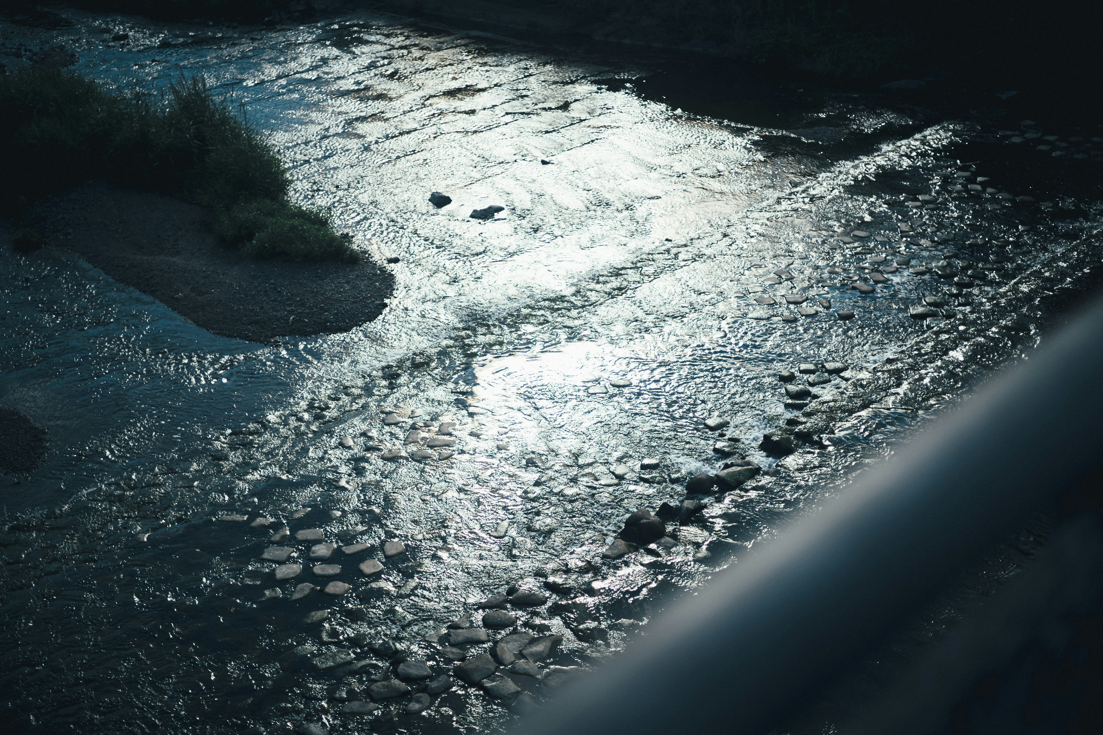 A scenic view of a river reflecting light