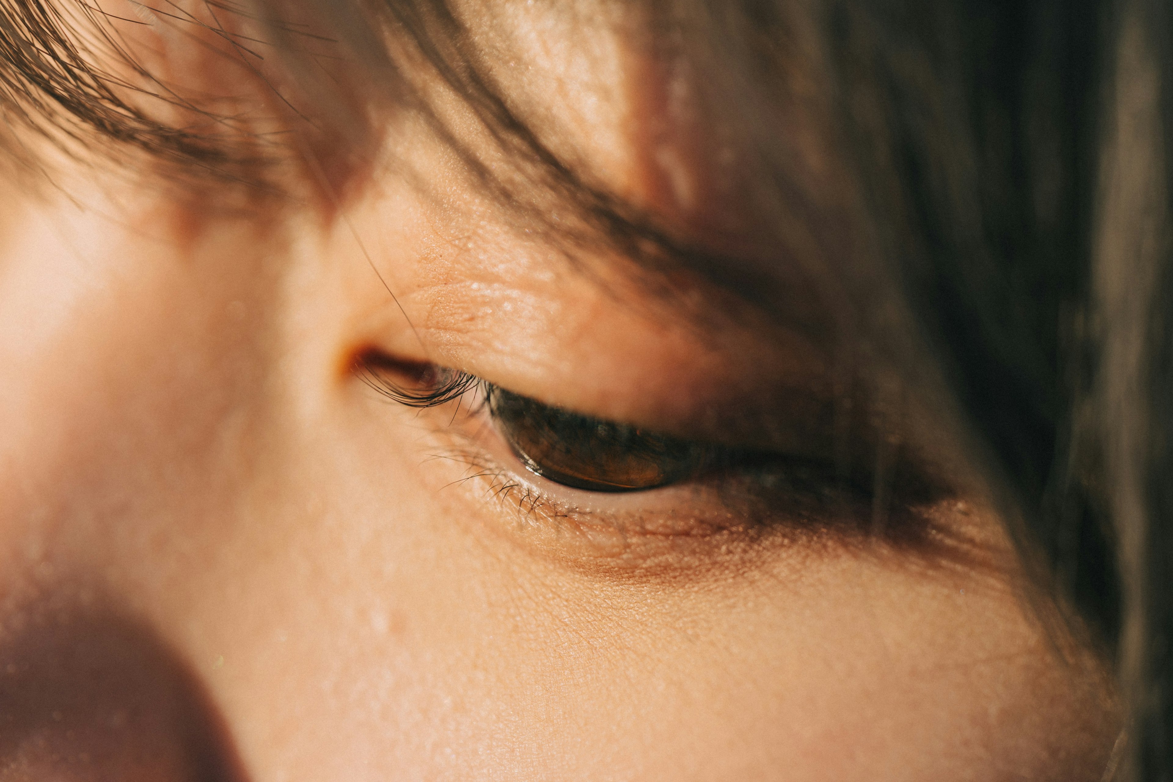 Close-up of an eye with soft colors in natural light