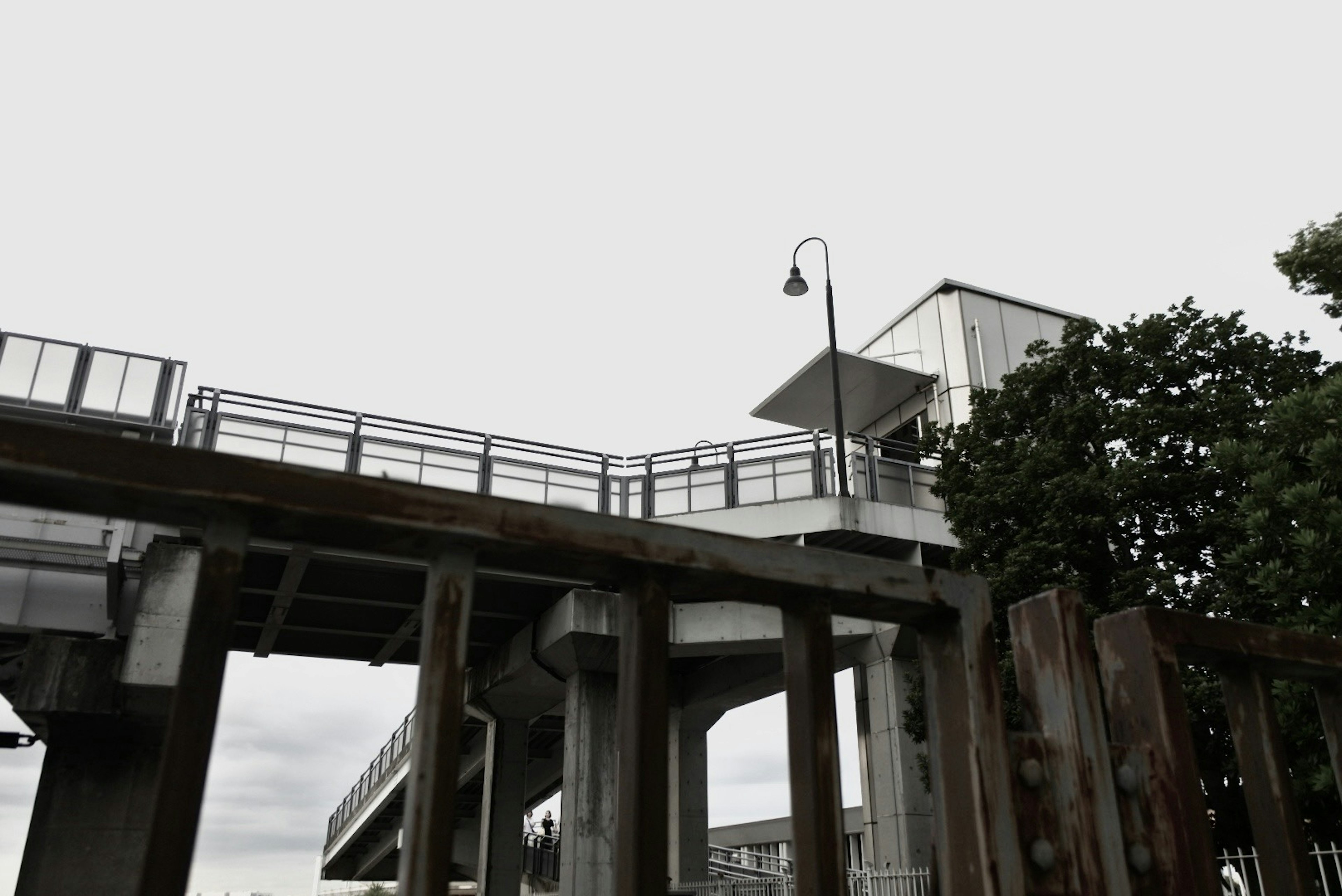 Image of an elevated station with surrounding greenery