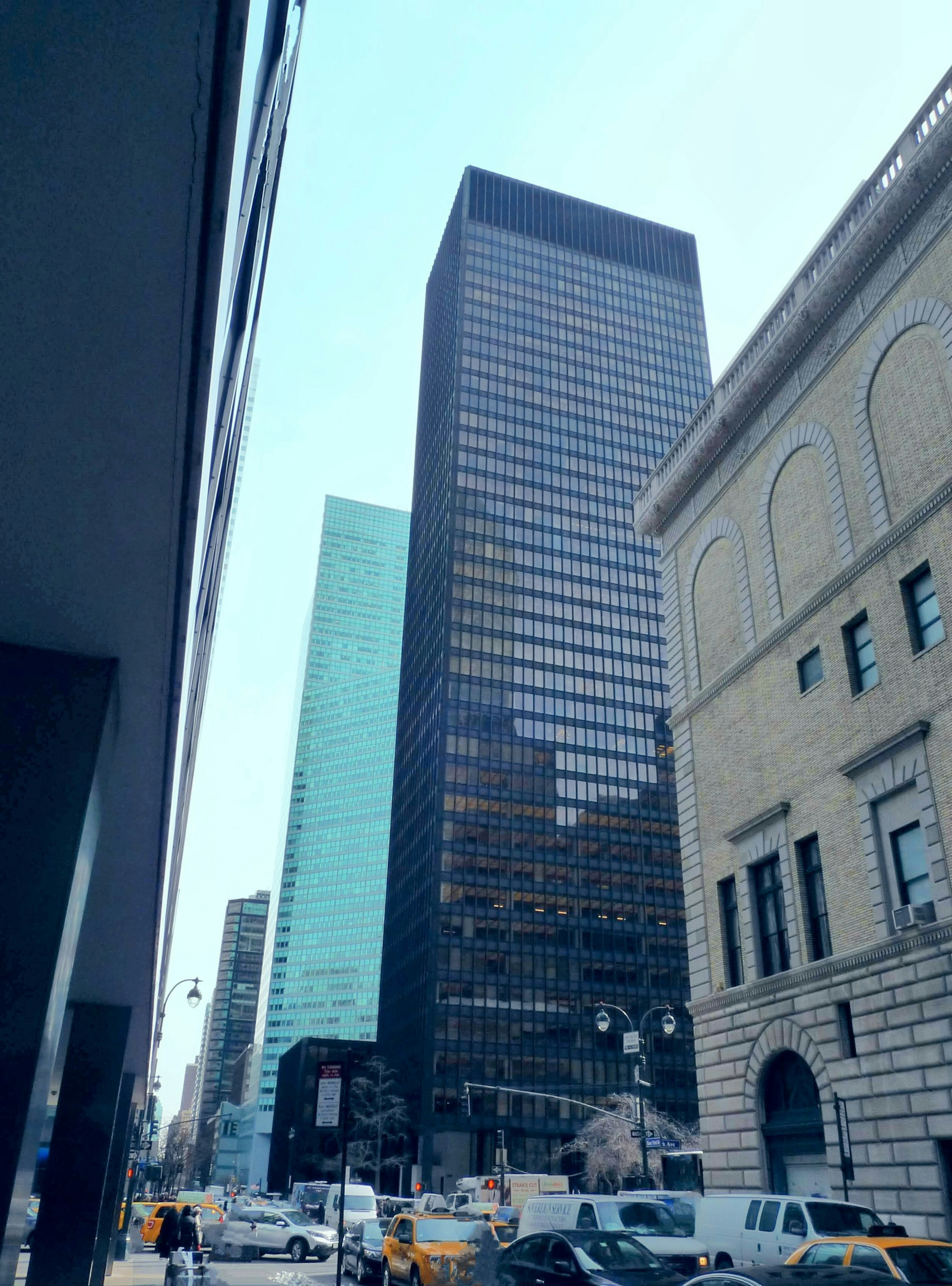 Cityscape featuring skyscrapers and historic buildings