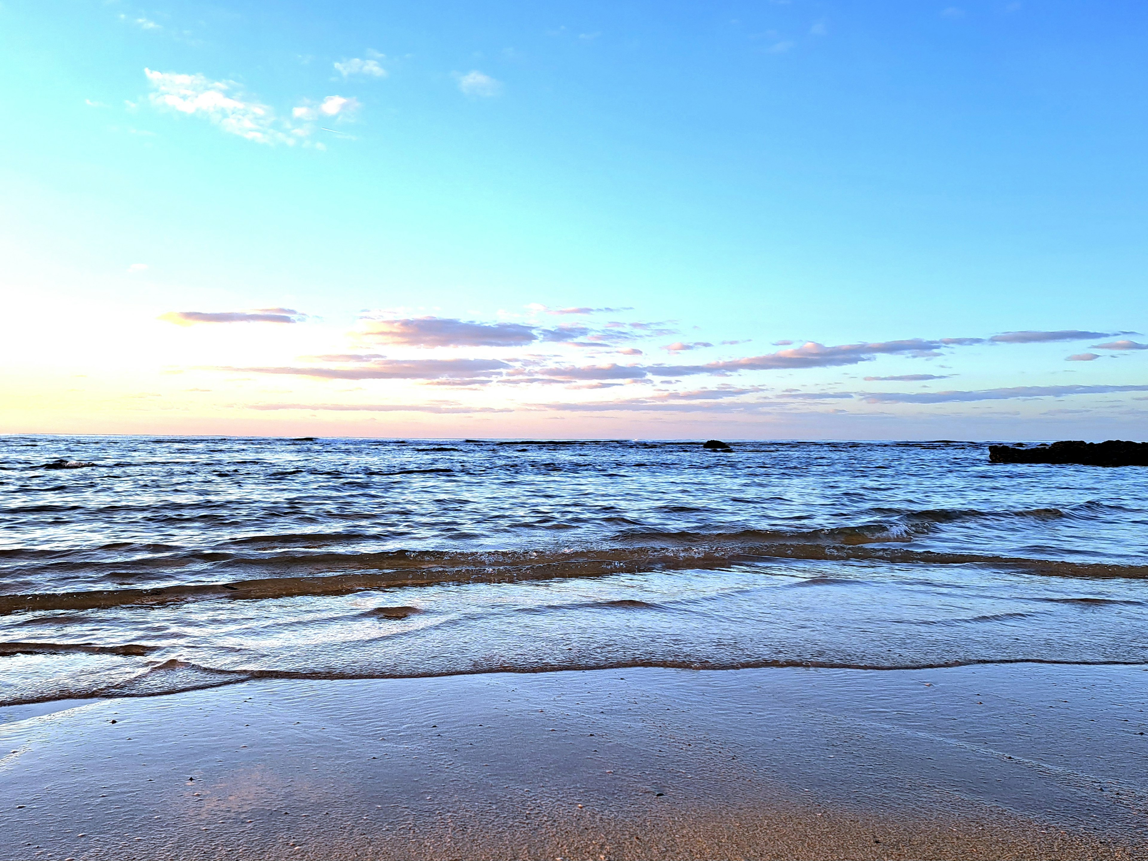 Beautiful seascape with a blue sky and gentle waves