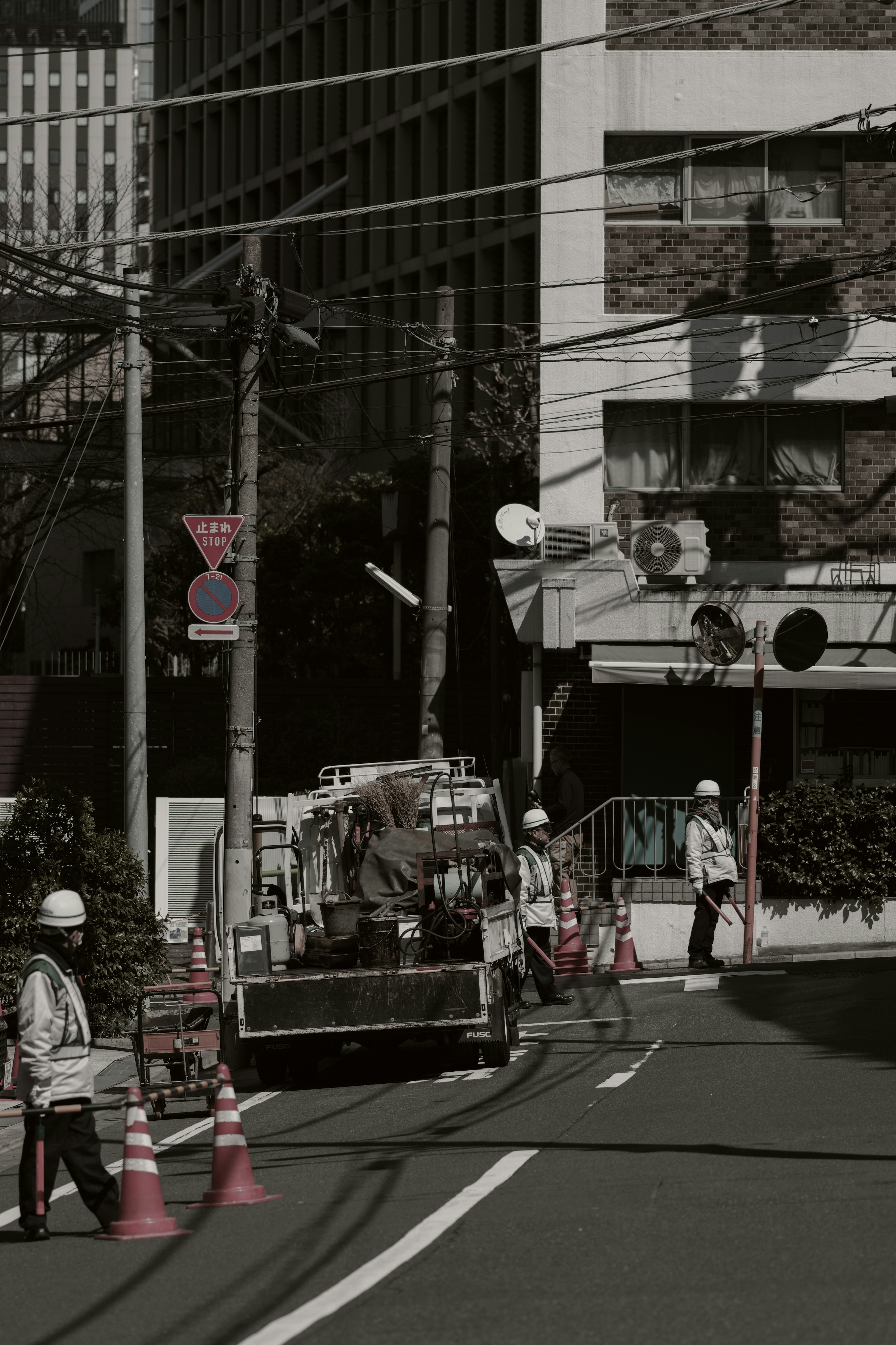 Urban scene with construction workers and machinery