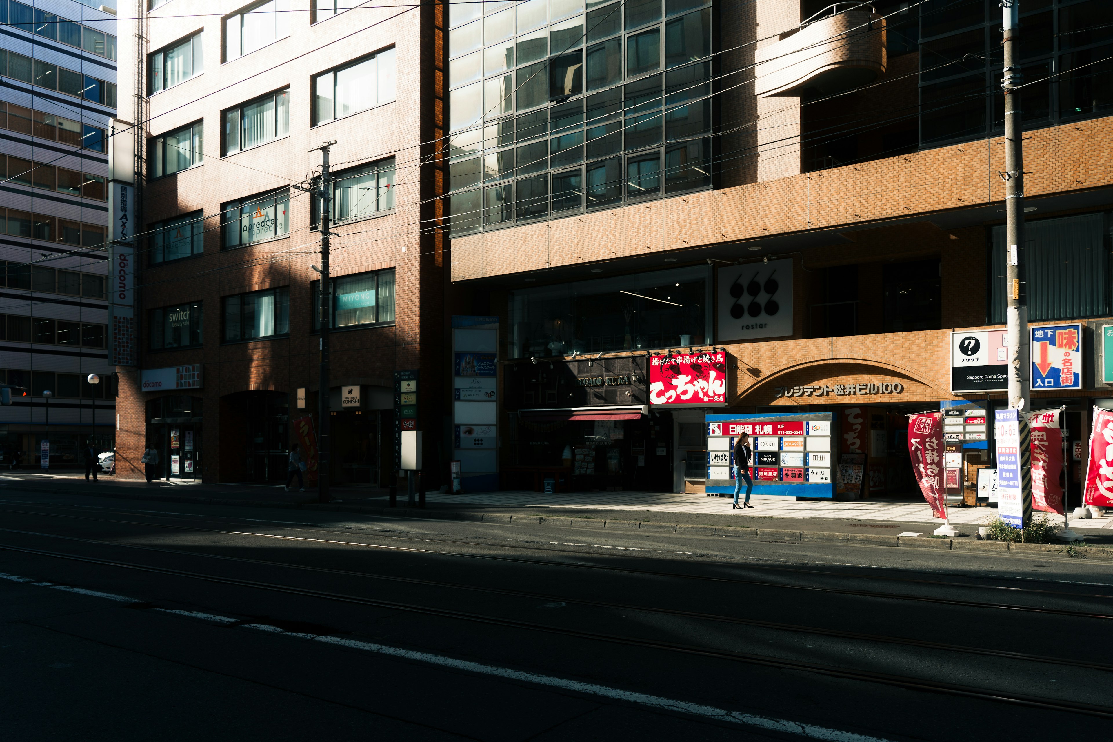 Urban landscape featuring building facades and shadows