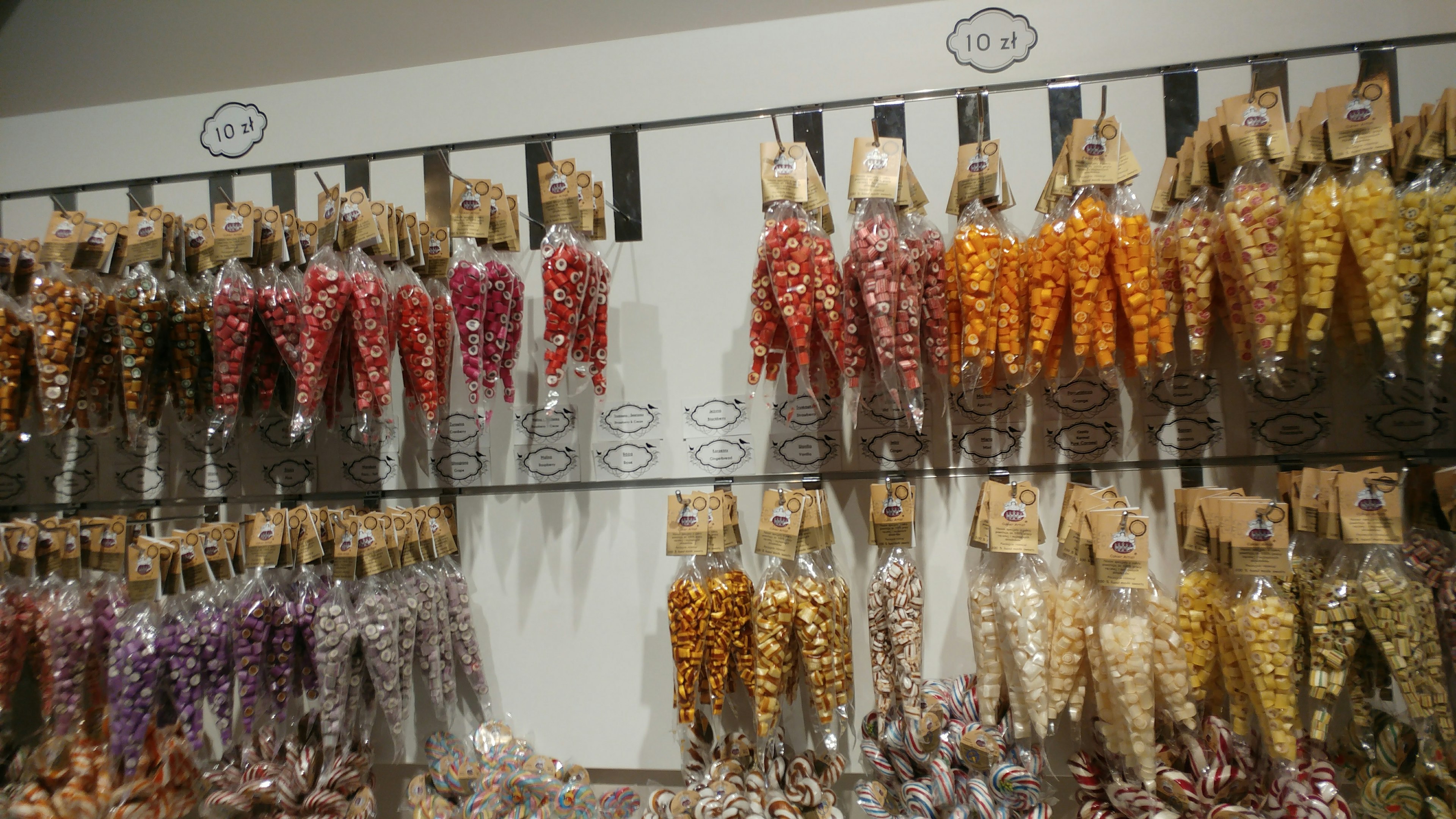 Display of colorful packages containing dried flowers