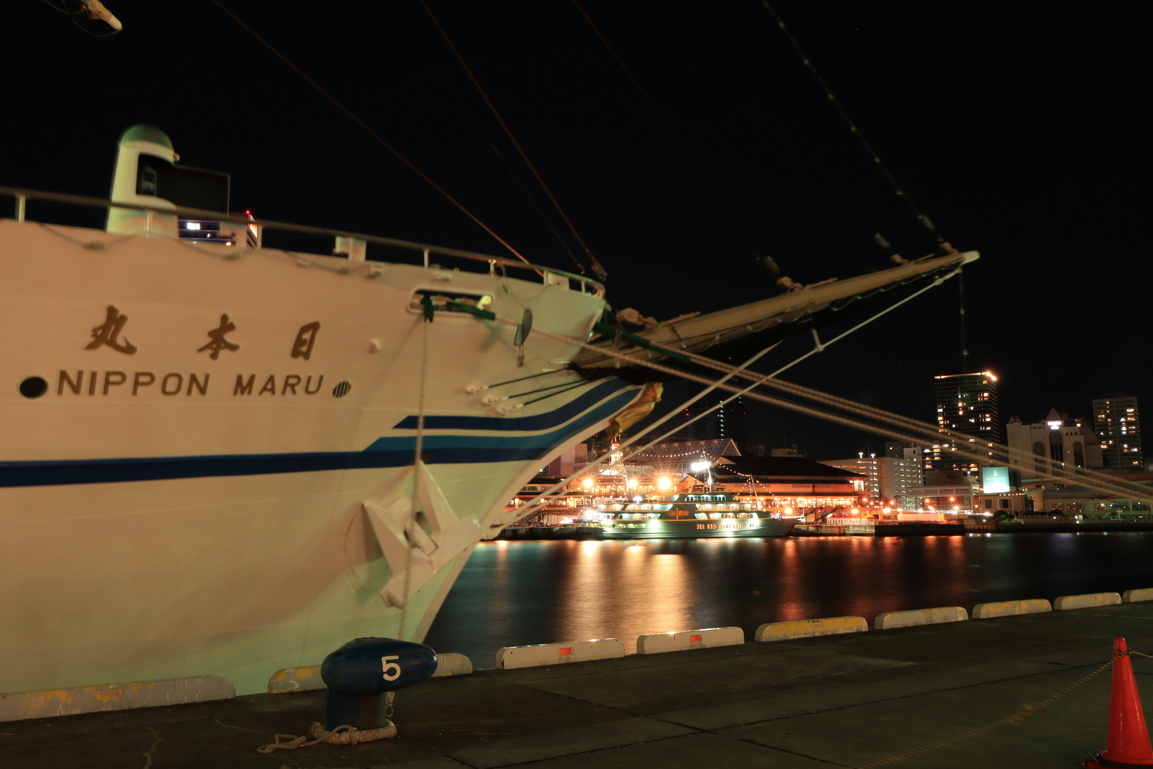 Nippon Maru ship docked at night in the harbor