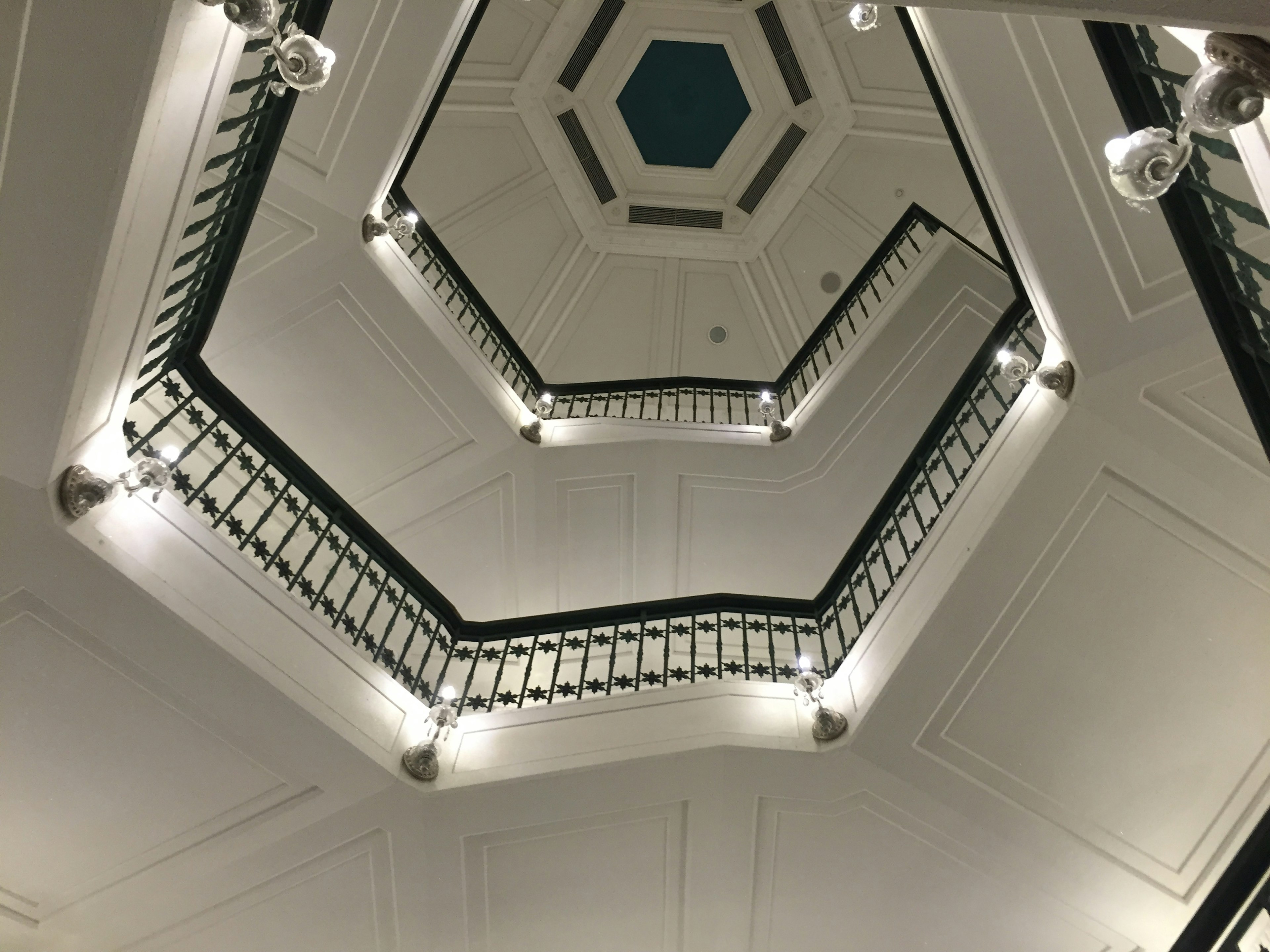 Interior view featuring an octagonal ceiling and railings