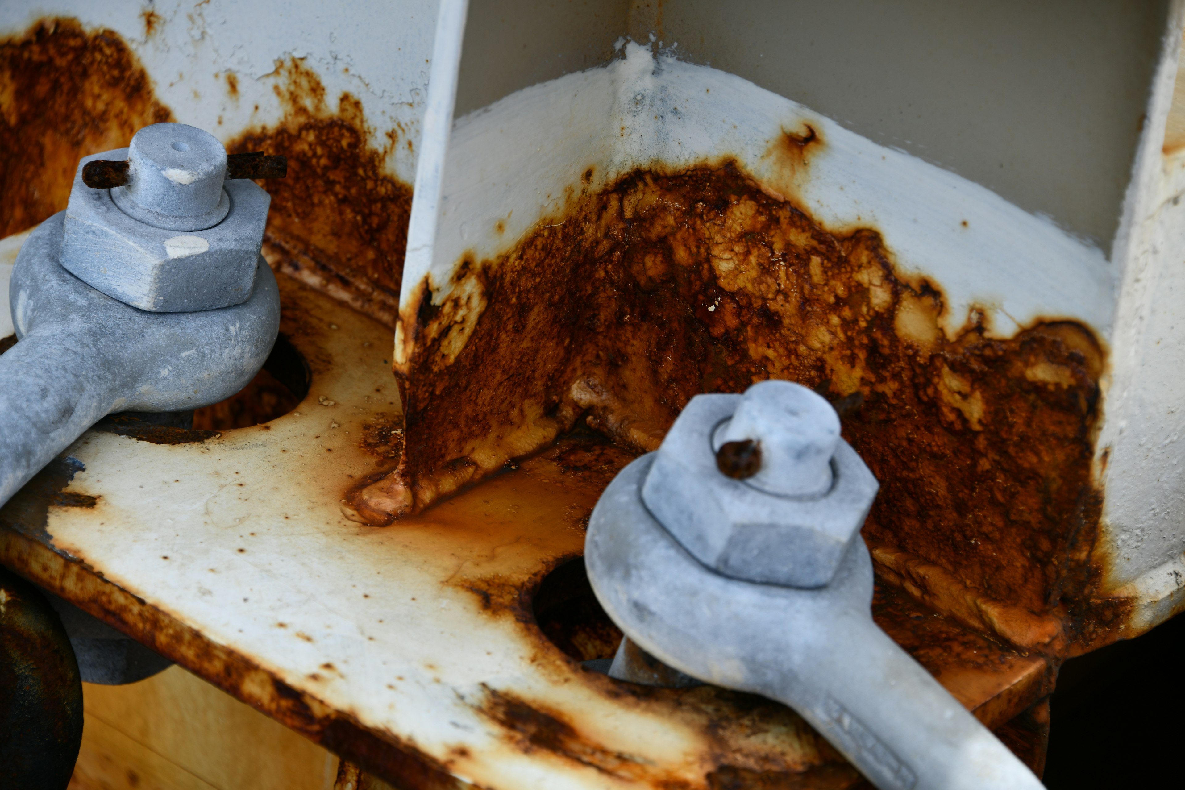 Close-up of rusted metal parts and nuts