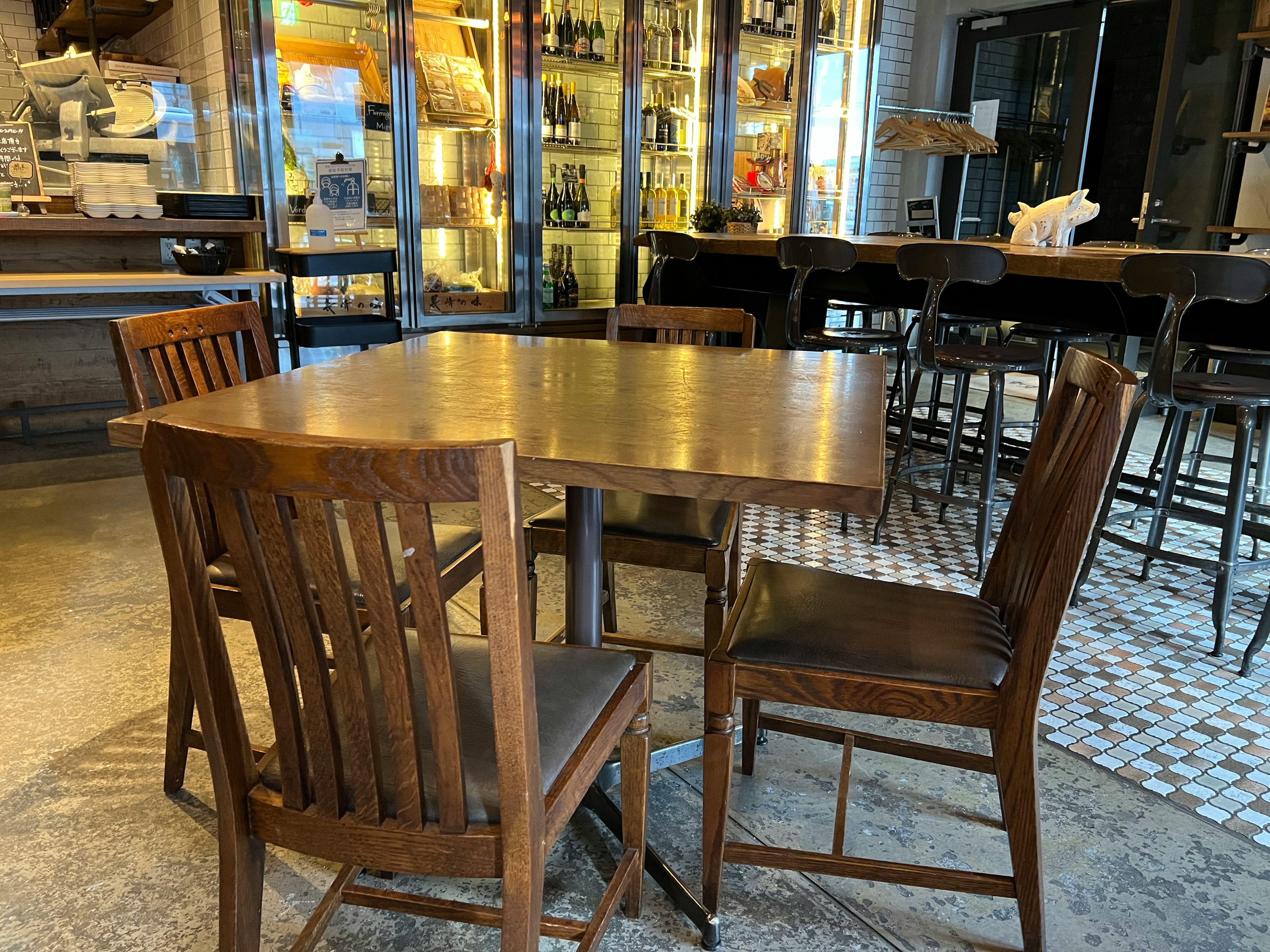 Modern café interior featuring a wooden table and chairs