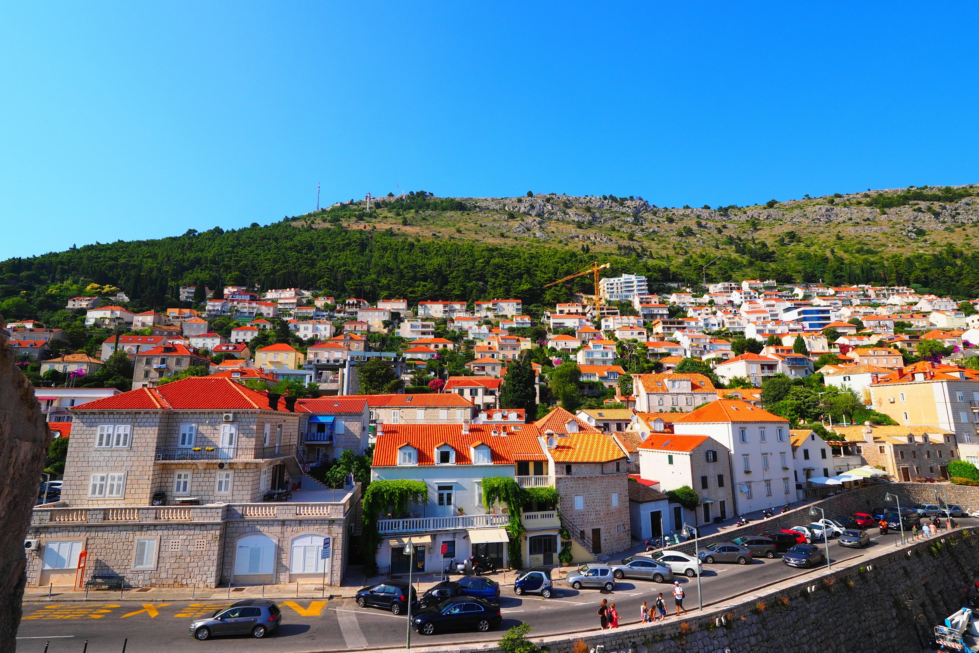 Residential area with colorful houses under a clear blue sky