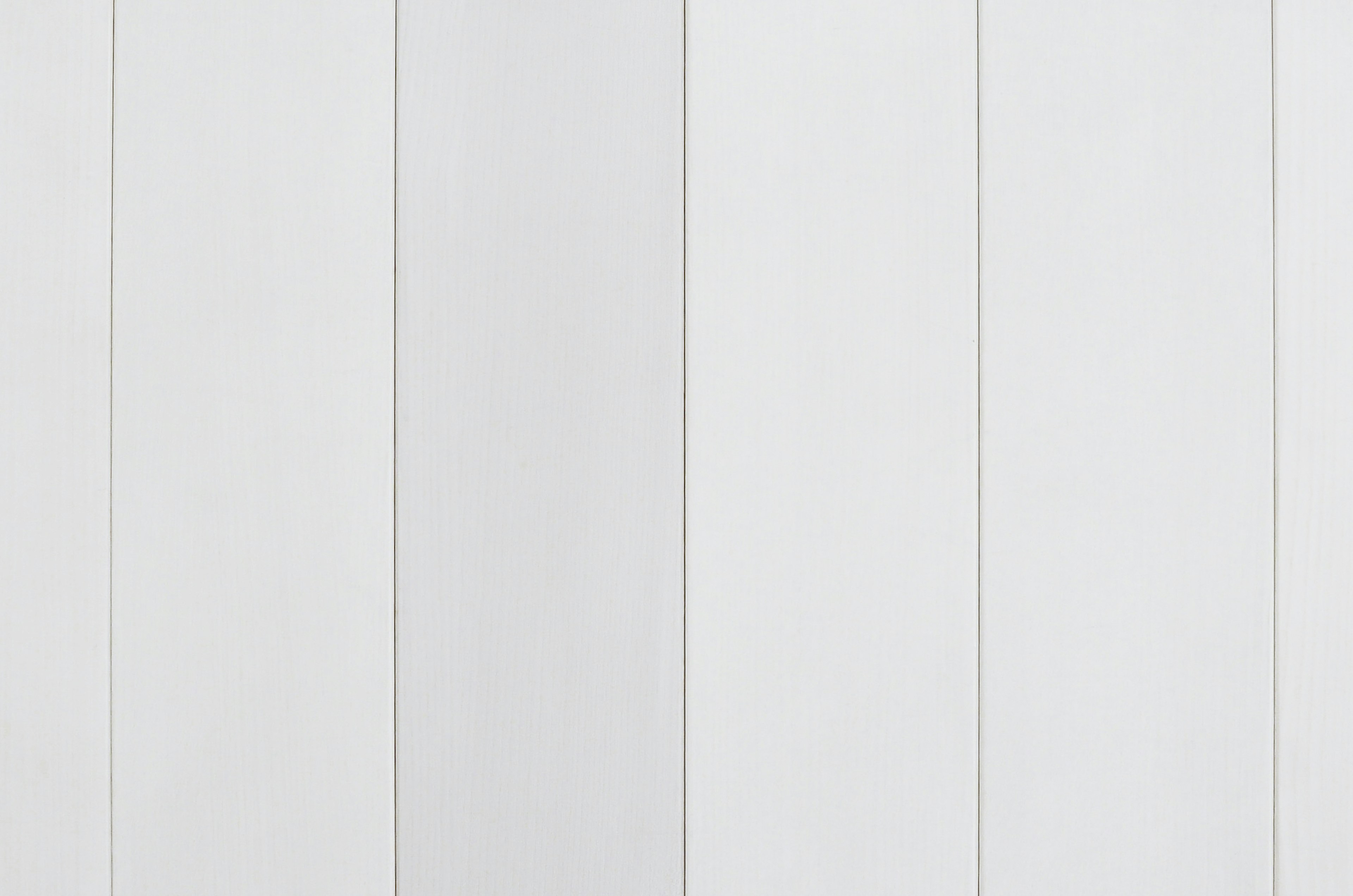 White wooden wall panels arranged vertically