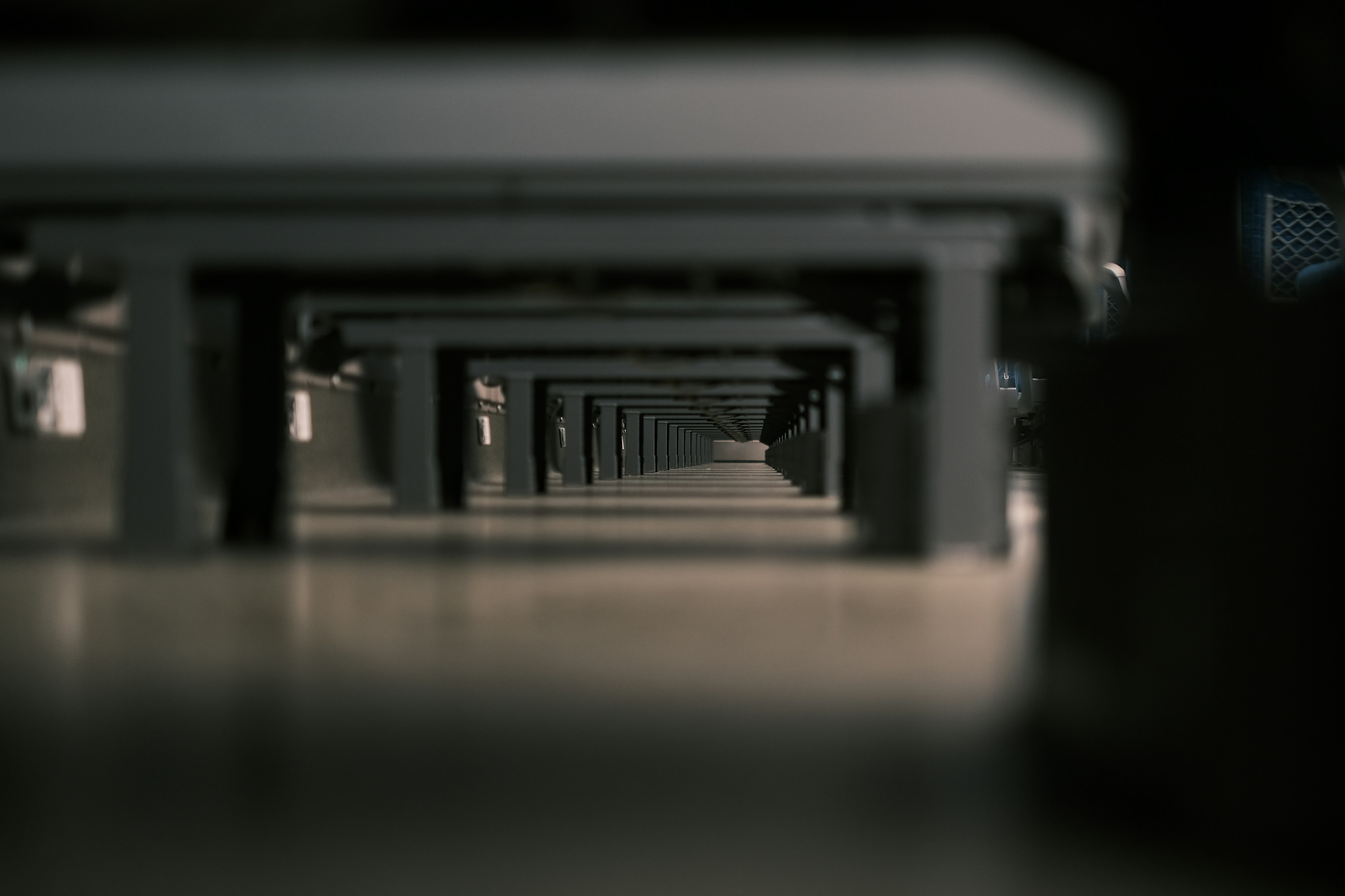 Perspective view of a long corridor created by tables