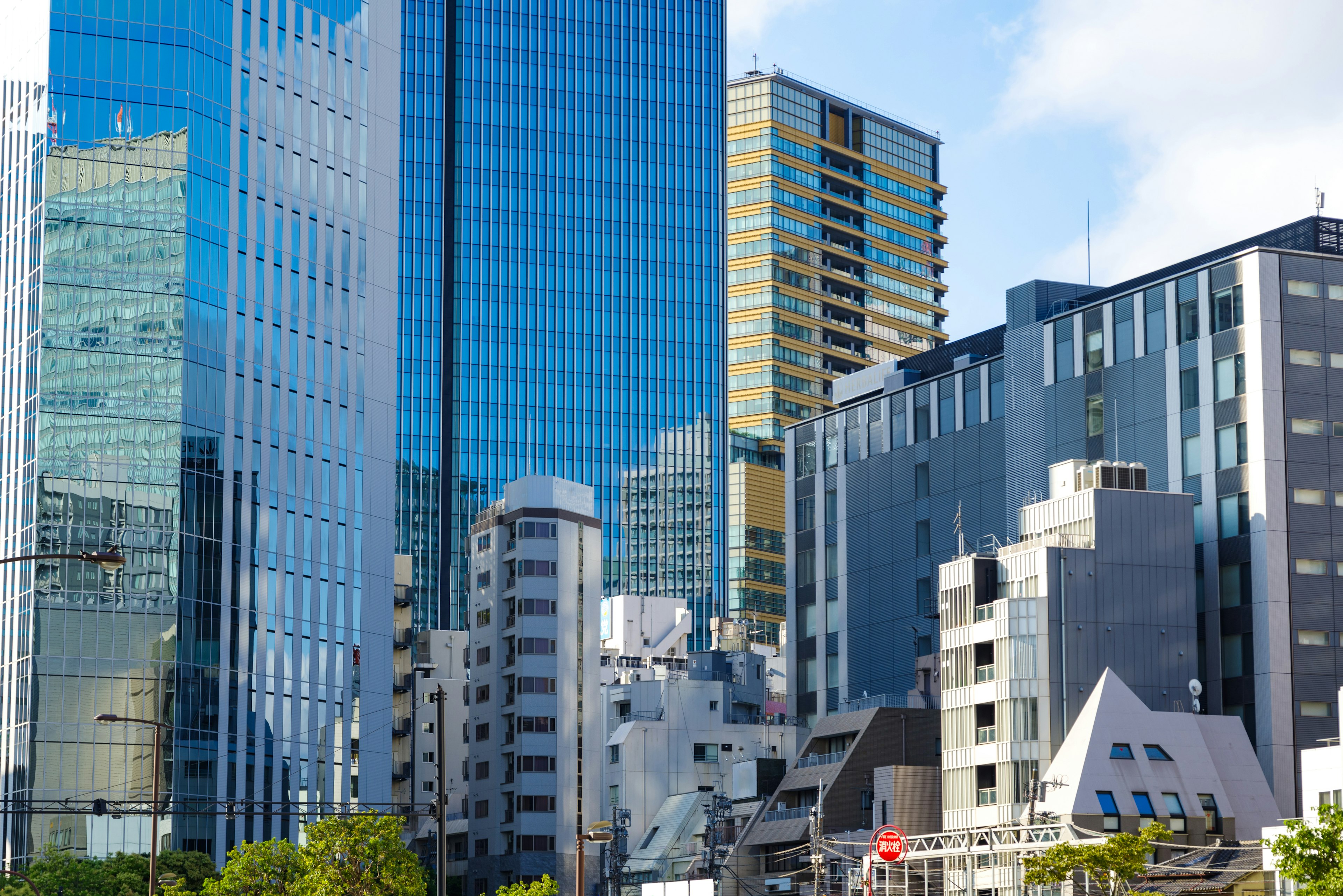 Urban landscape featuring tall buildings and glass facades