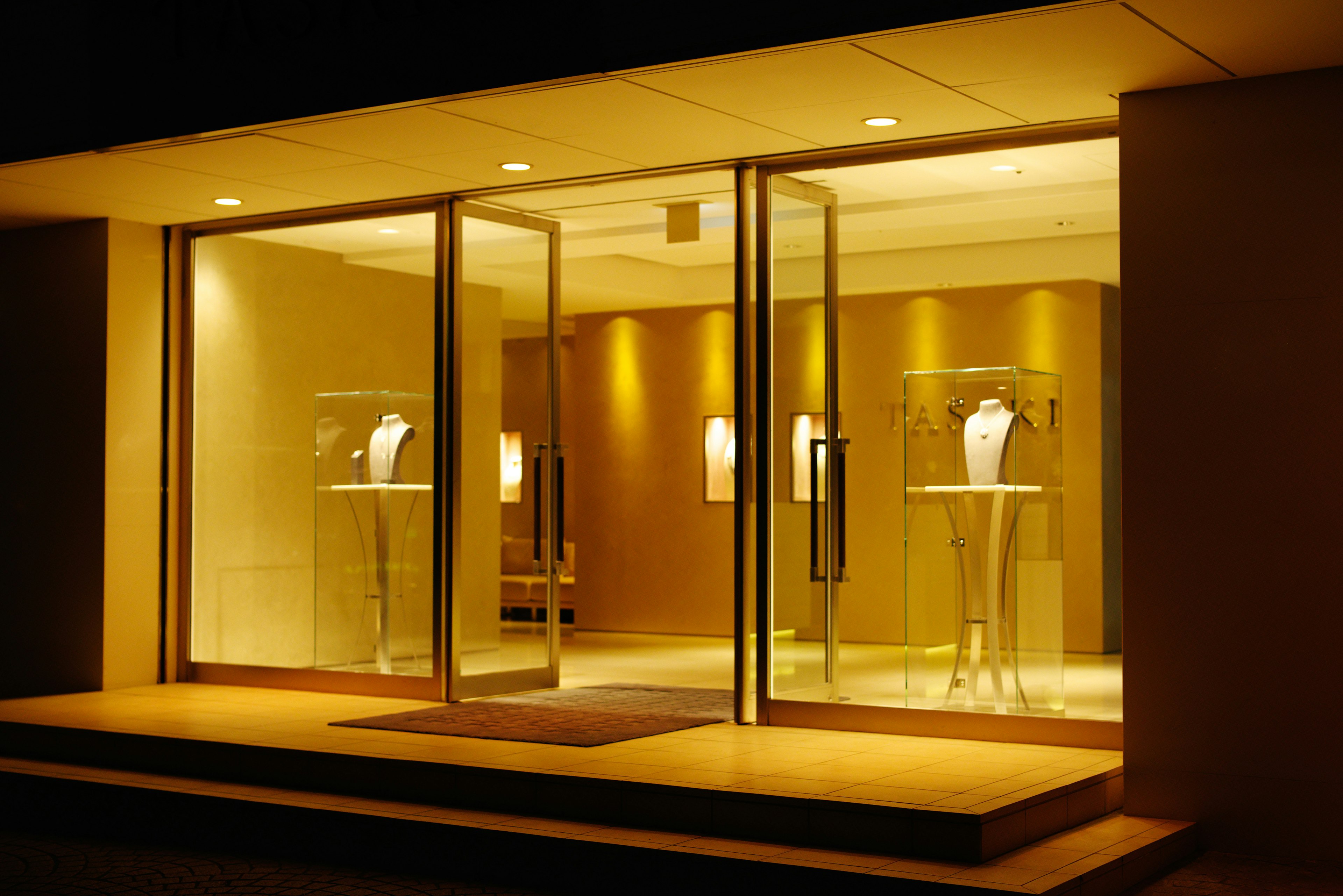 Elegant jewelry store entrance with illuminated displays