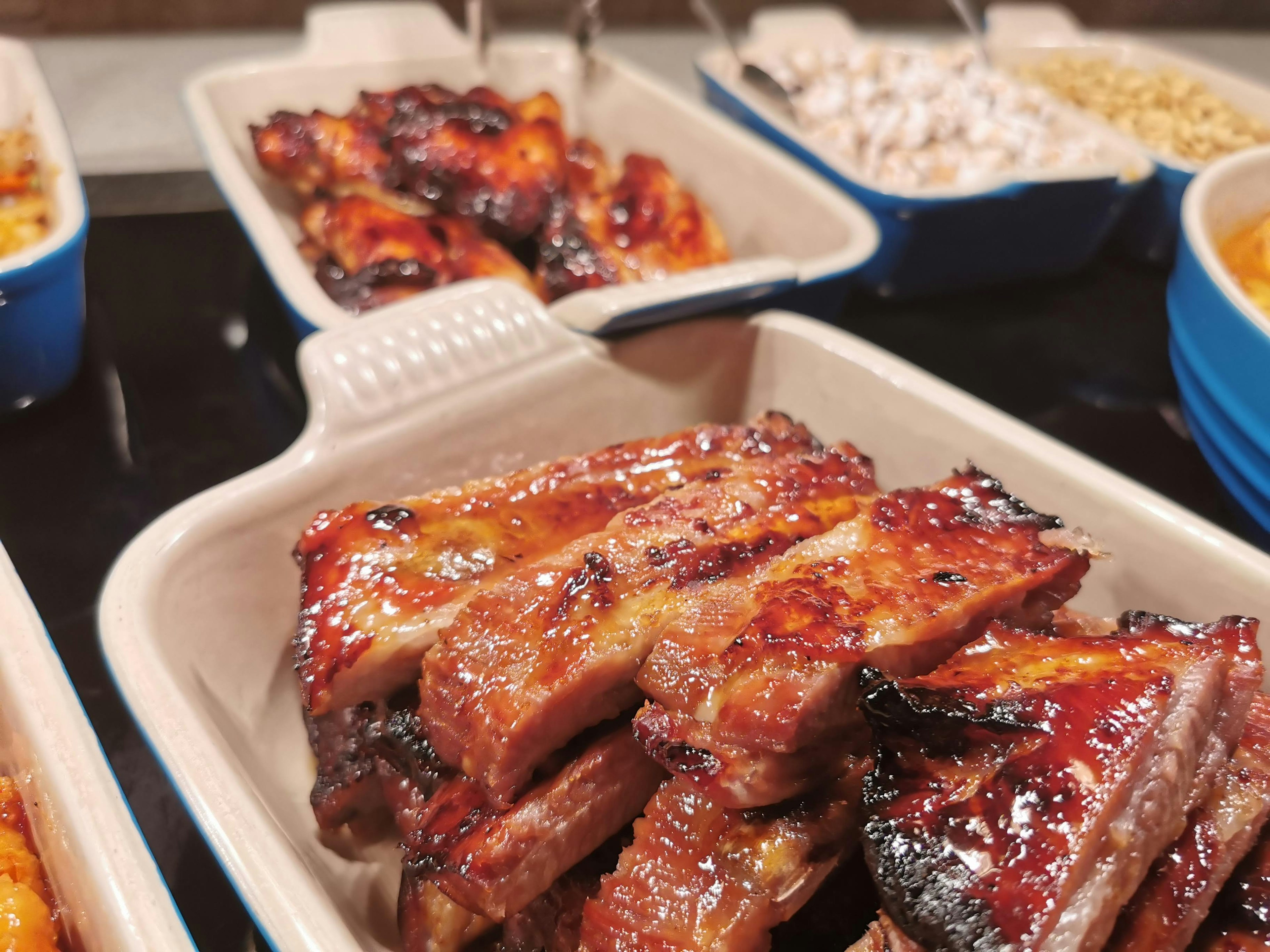 Deliciously glazed grilled ribs served in a dish