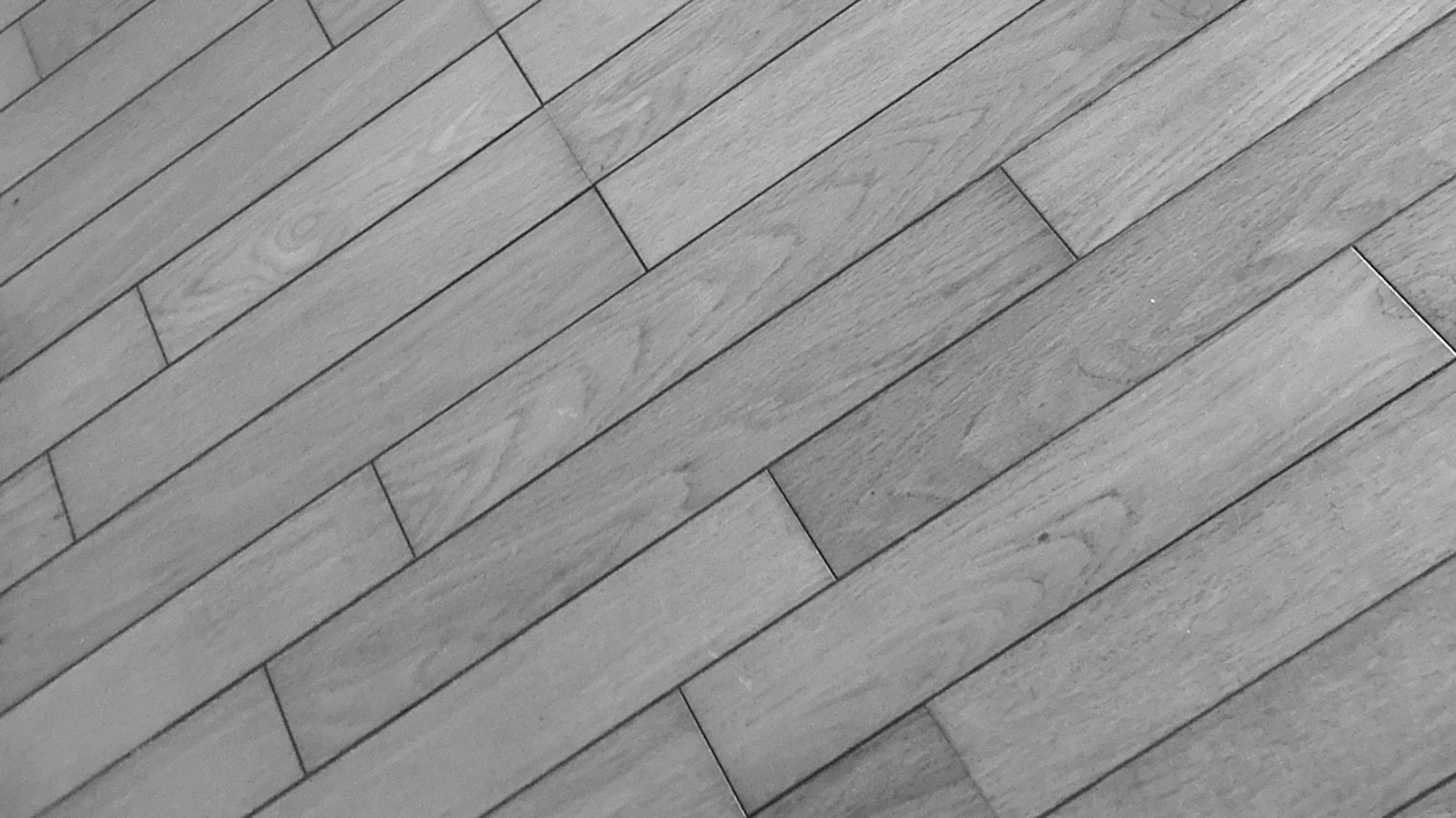 Motivo diagonale della texture del pavimento in legno