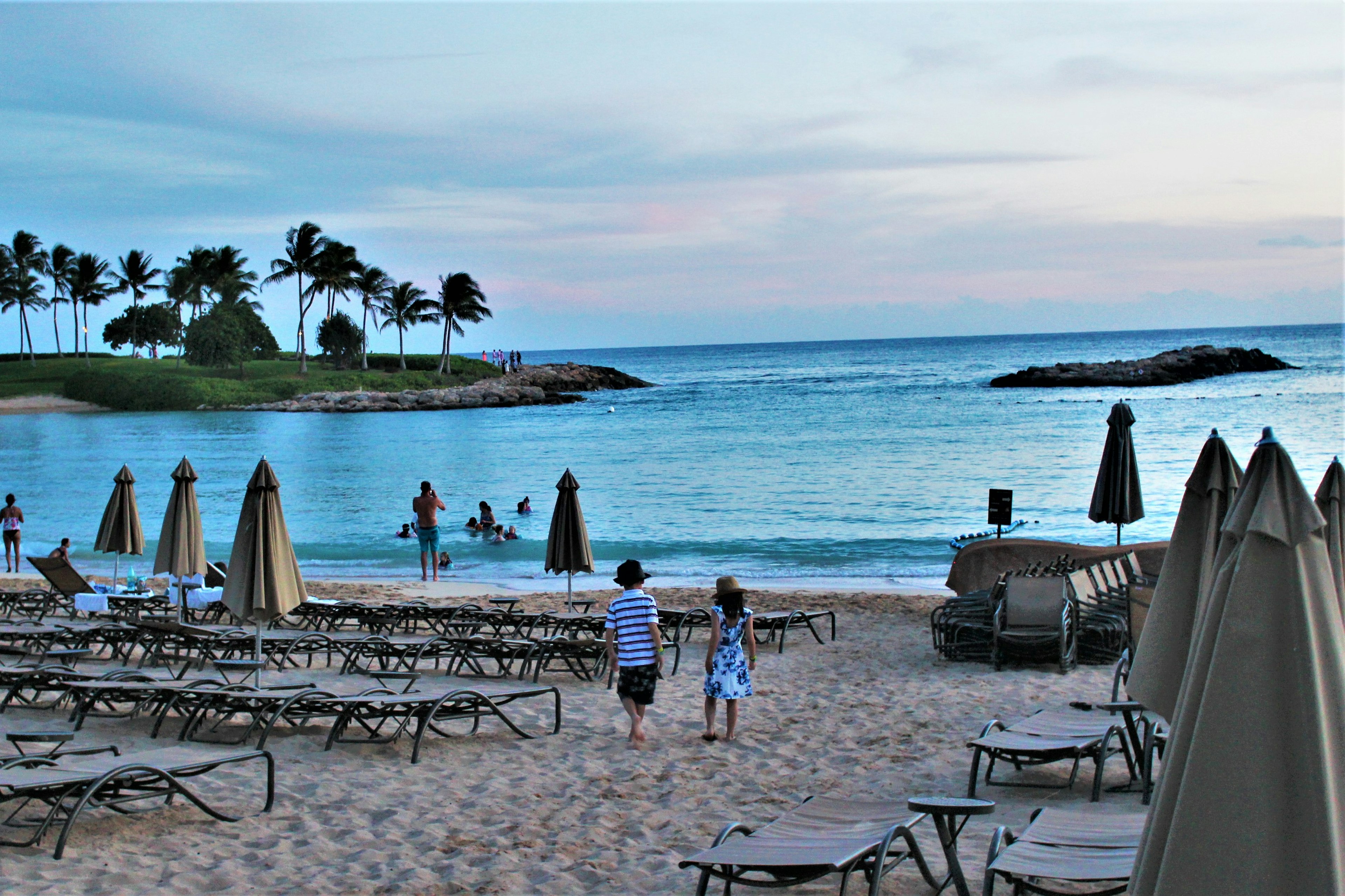 Children playing on the beach with ocean view