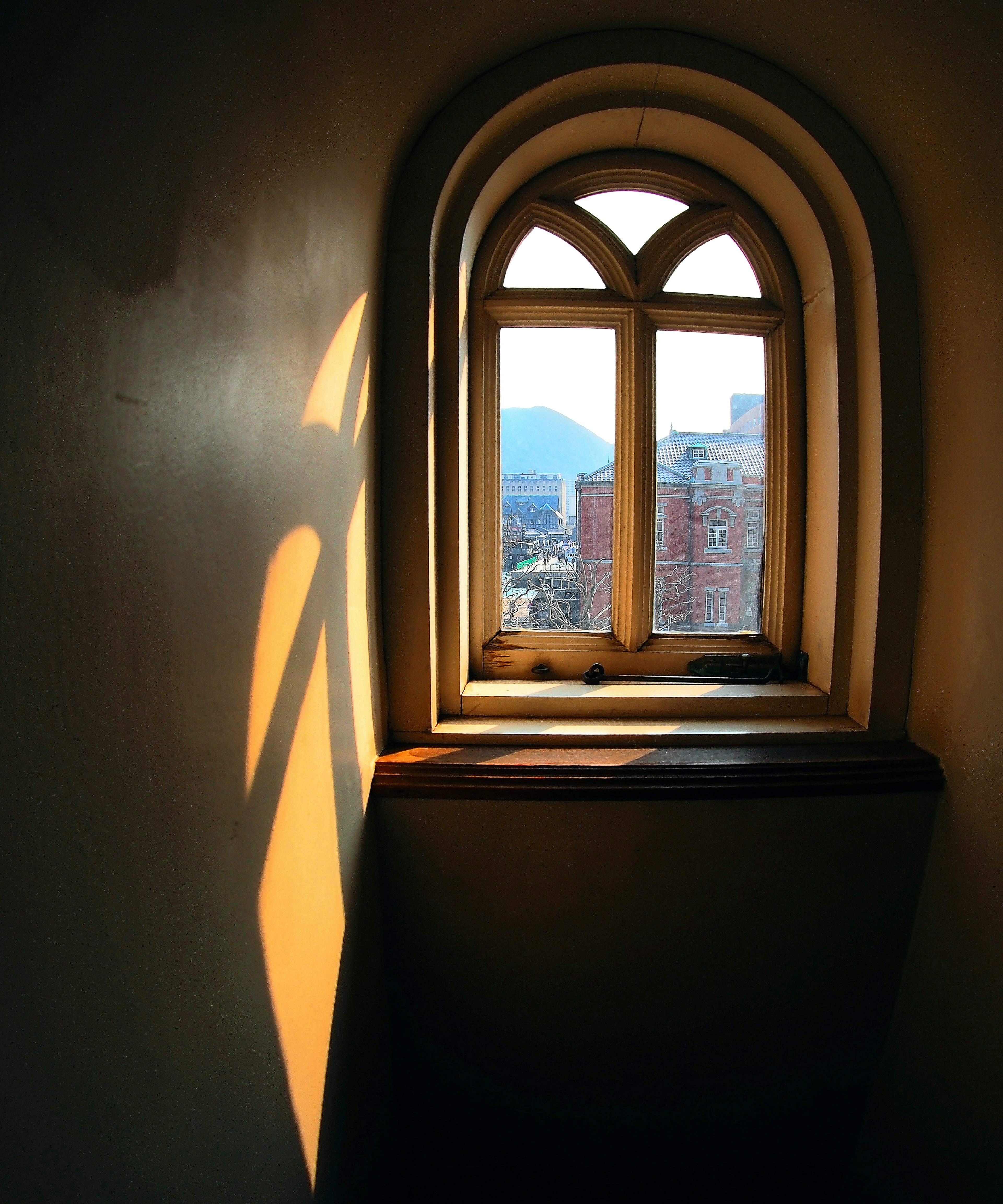 Interior view with a beautiful arched window letting in light