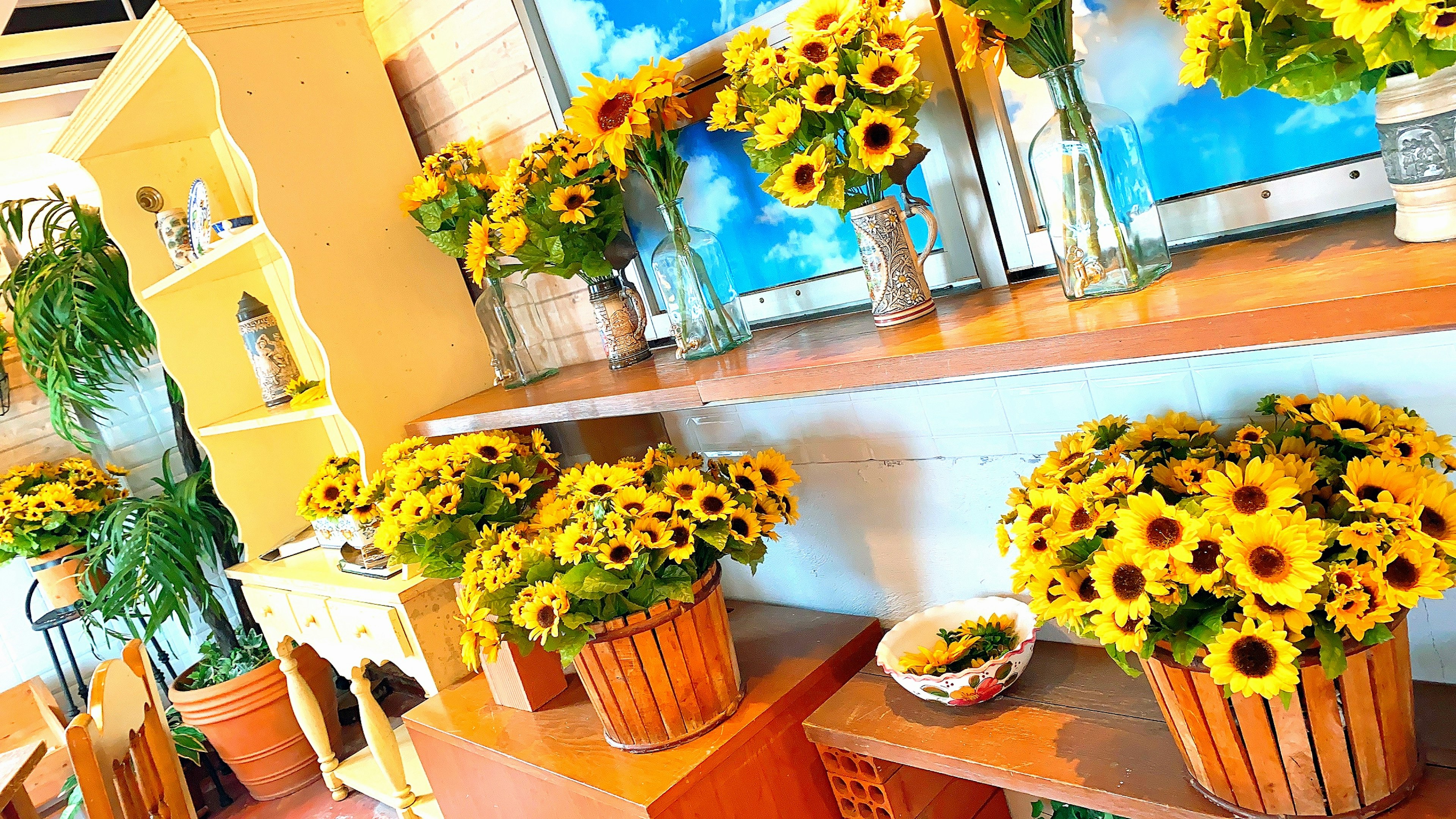 Bright sunflowers arranged in colorful interior decor