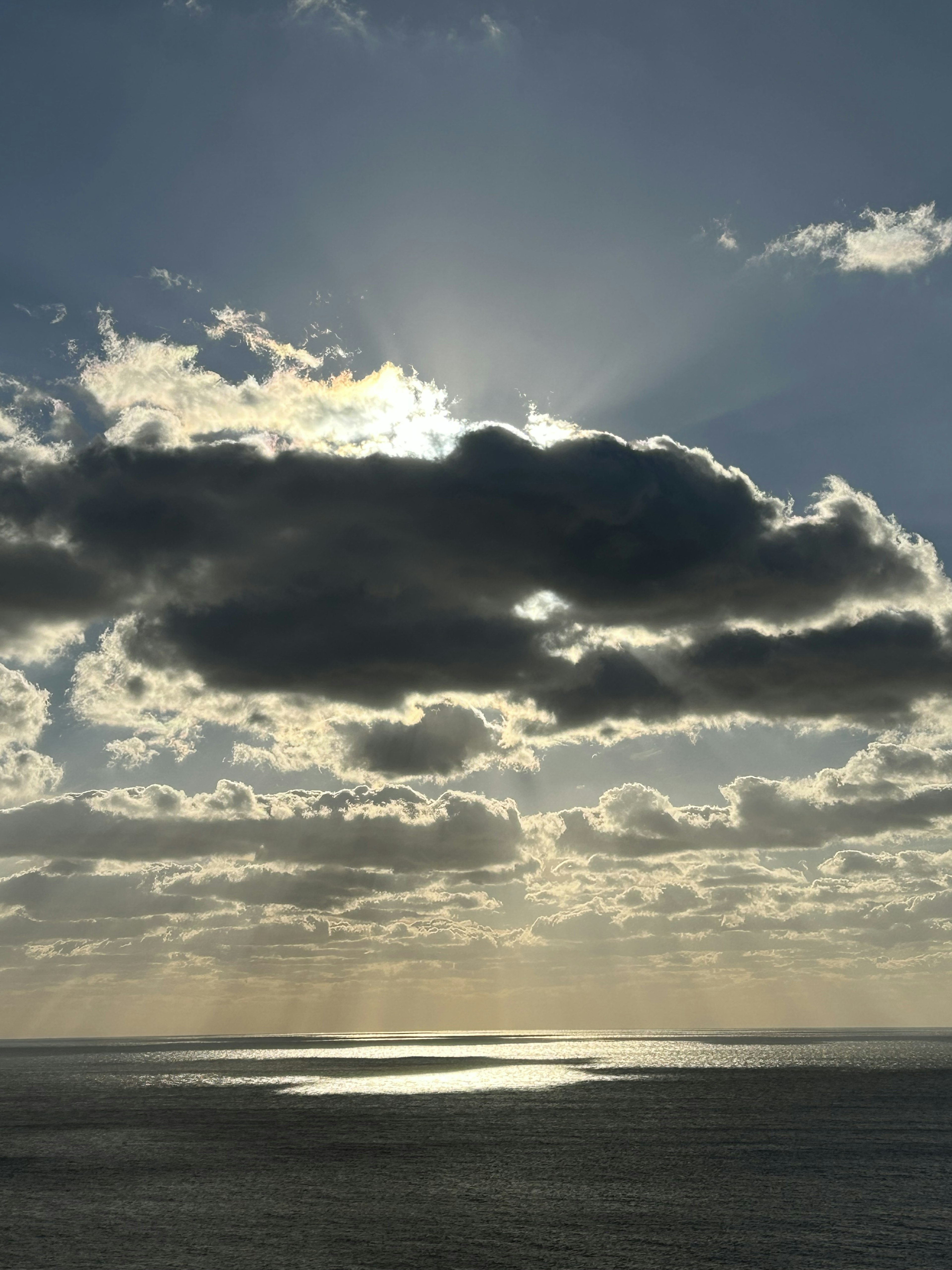 Clouds and rays of light above the ocean