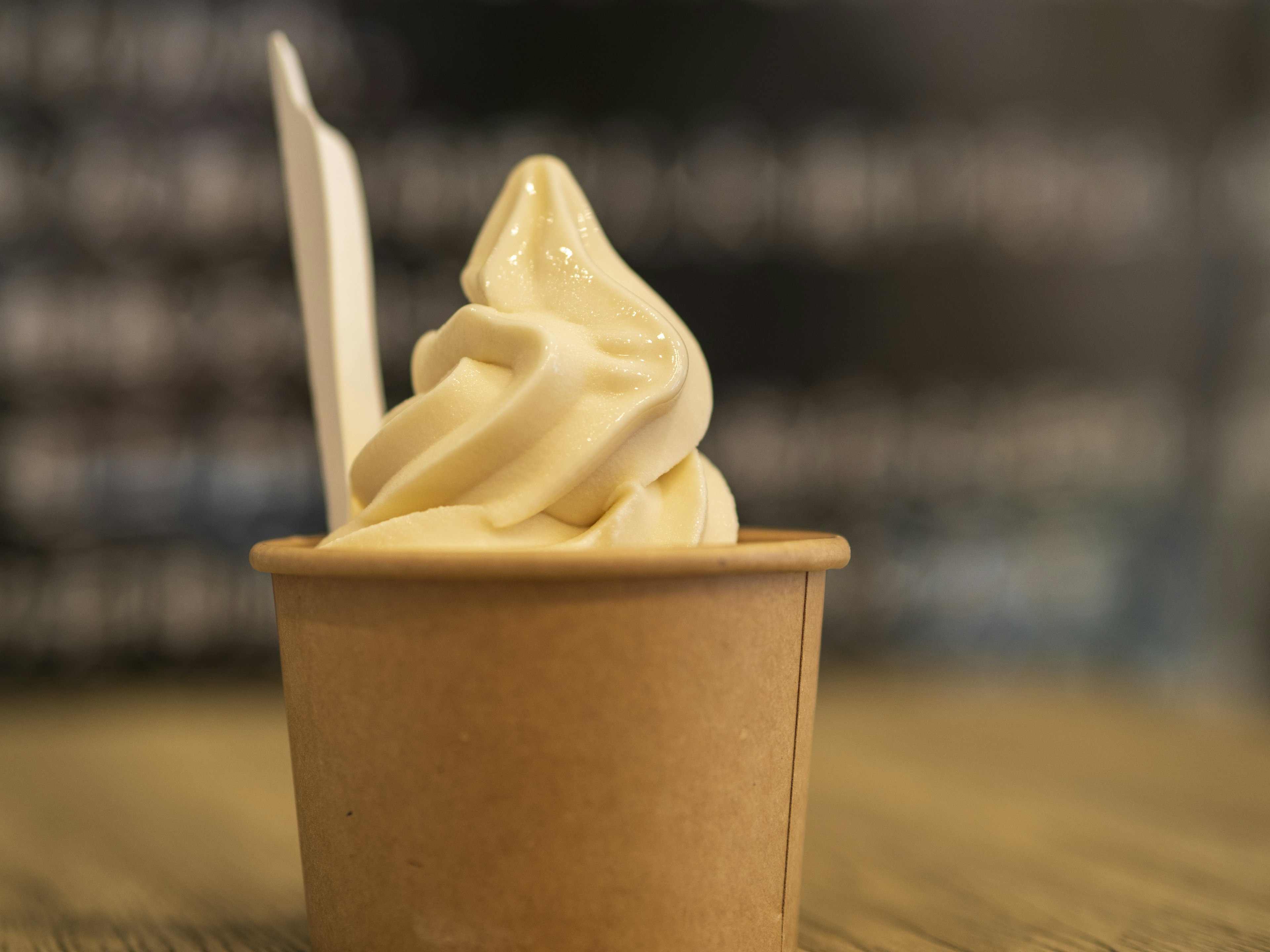 Creamy soft serve ice cream in a cup