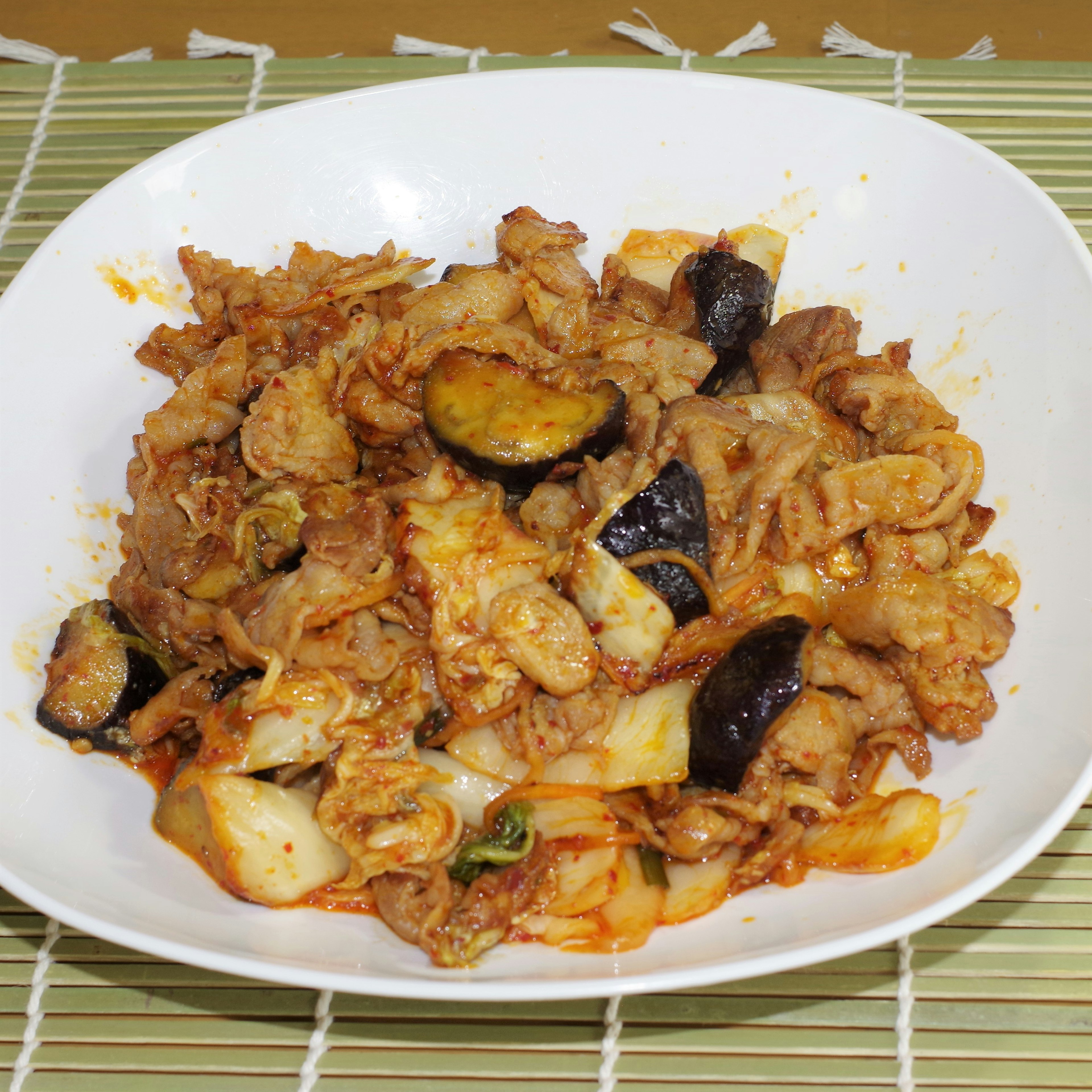 Stir-fried meat and vegetable dish served in a bowl