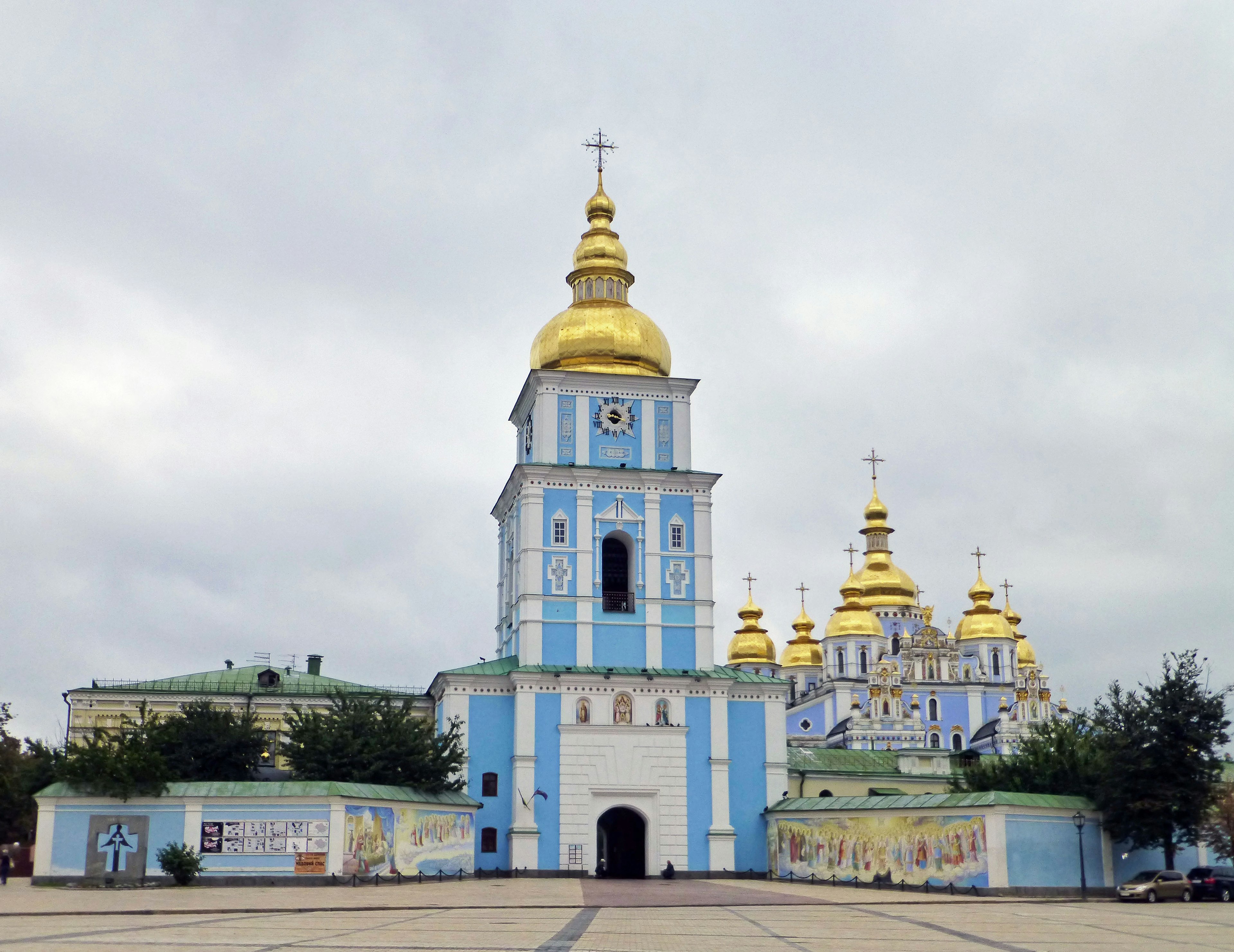 Exterior of St. Michael's Golden-Domed Cathedral featuring blue walls and golden domes