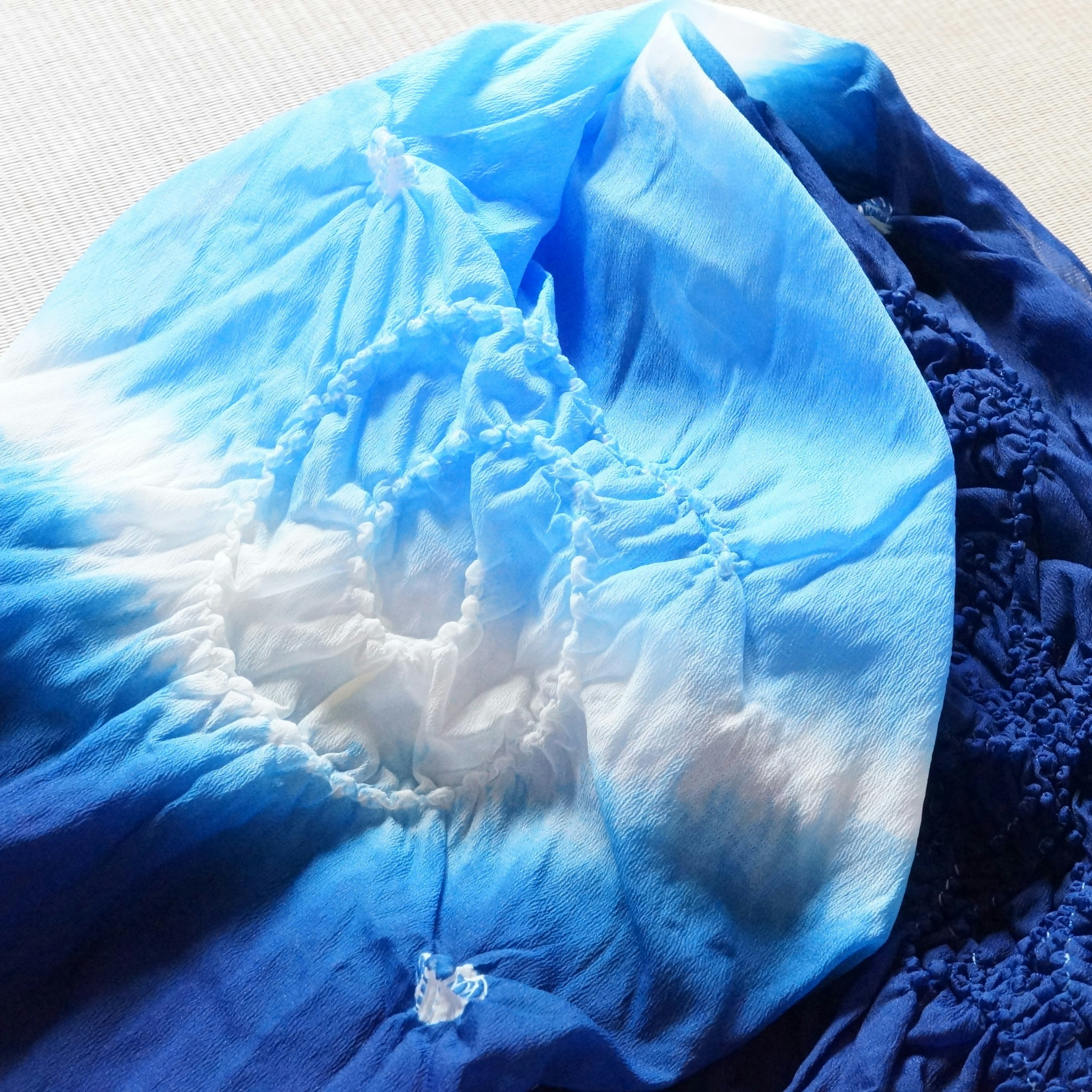 Blue gradient fabric with embroidery details