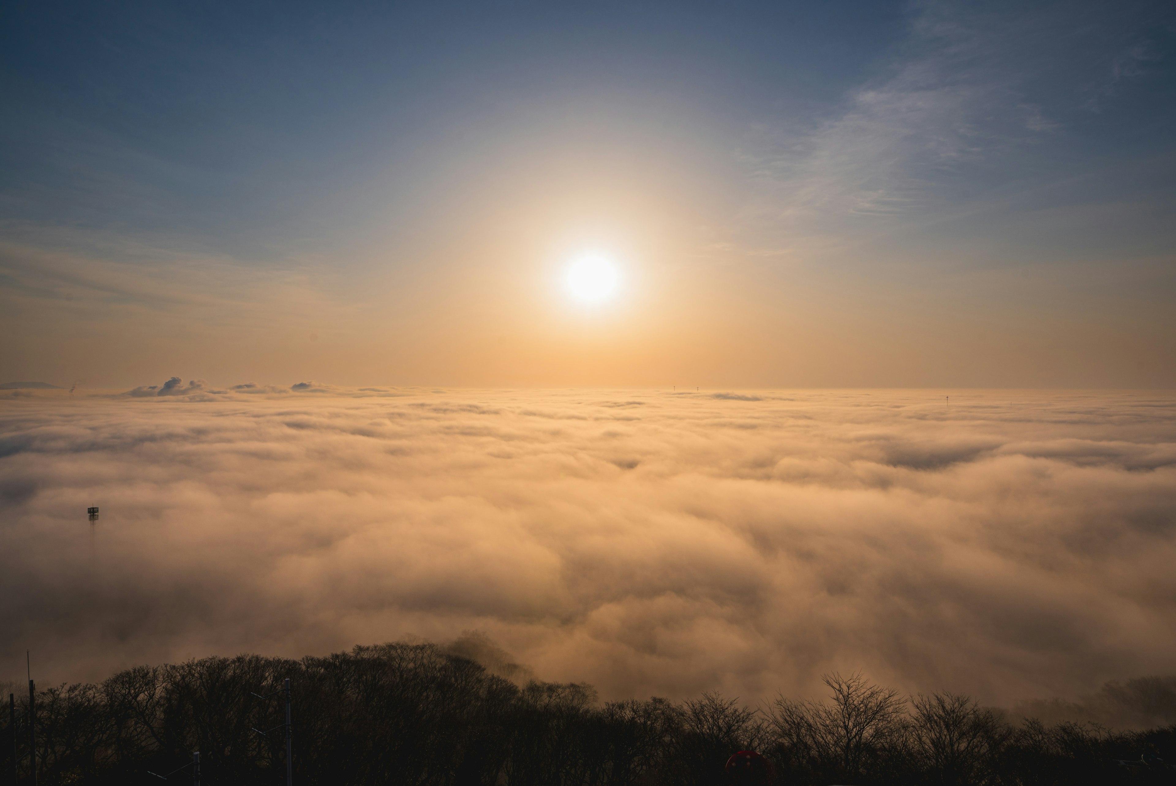 A beautiful view of sea of clouds with the sun