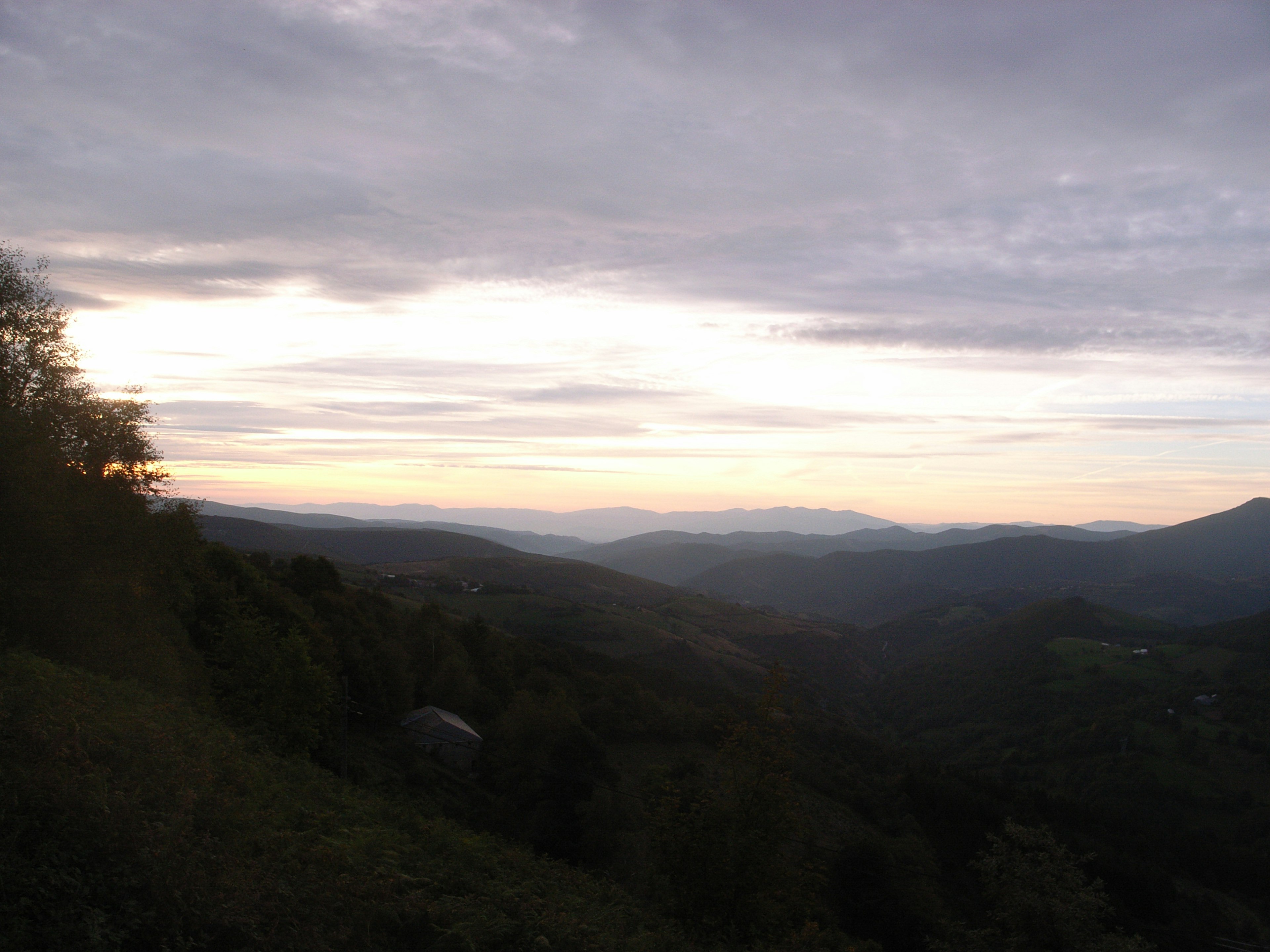 Mountain landscape with clouds at sunset