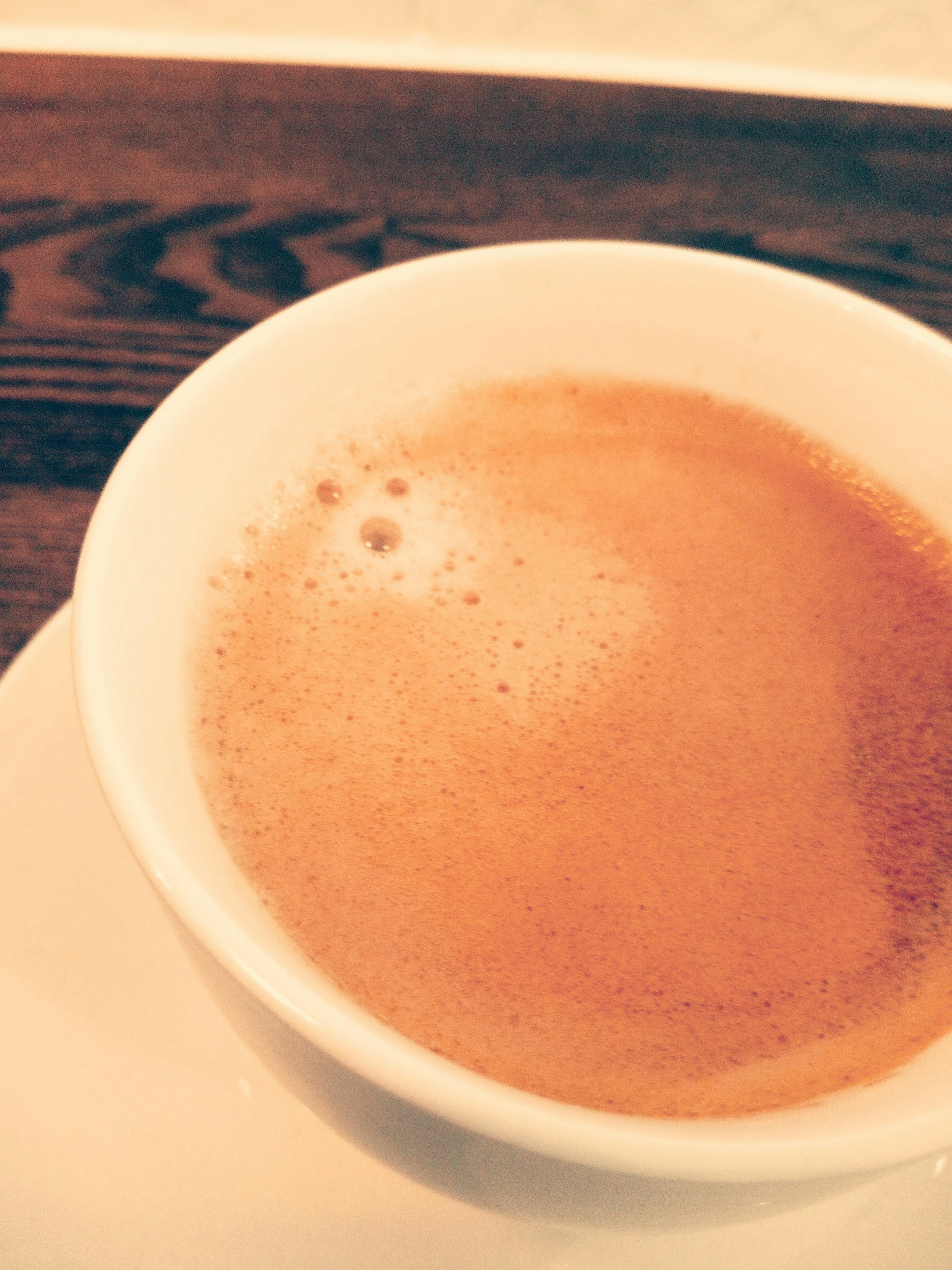 Close-up of espresso in a white bowl