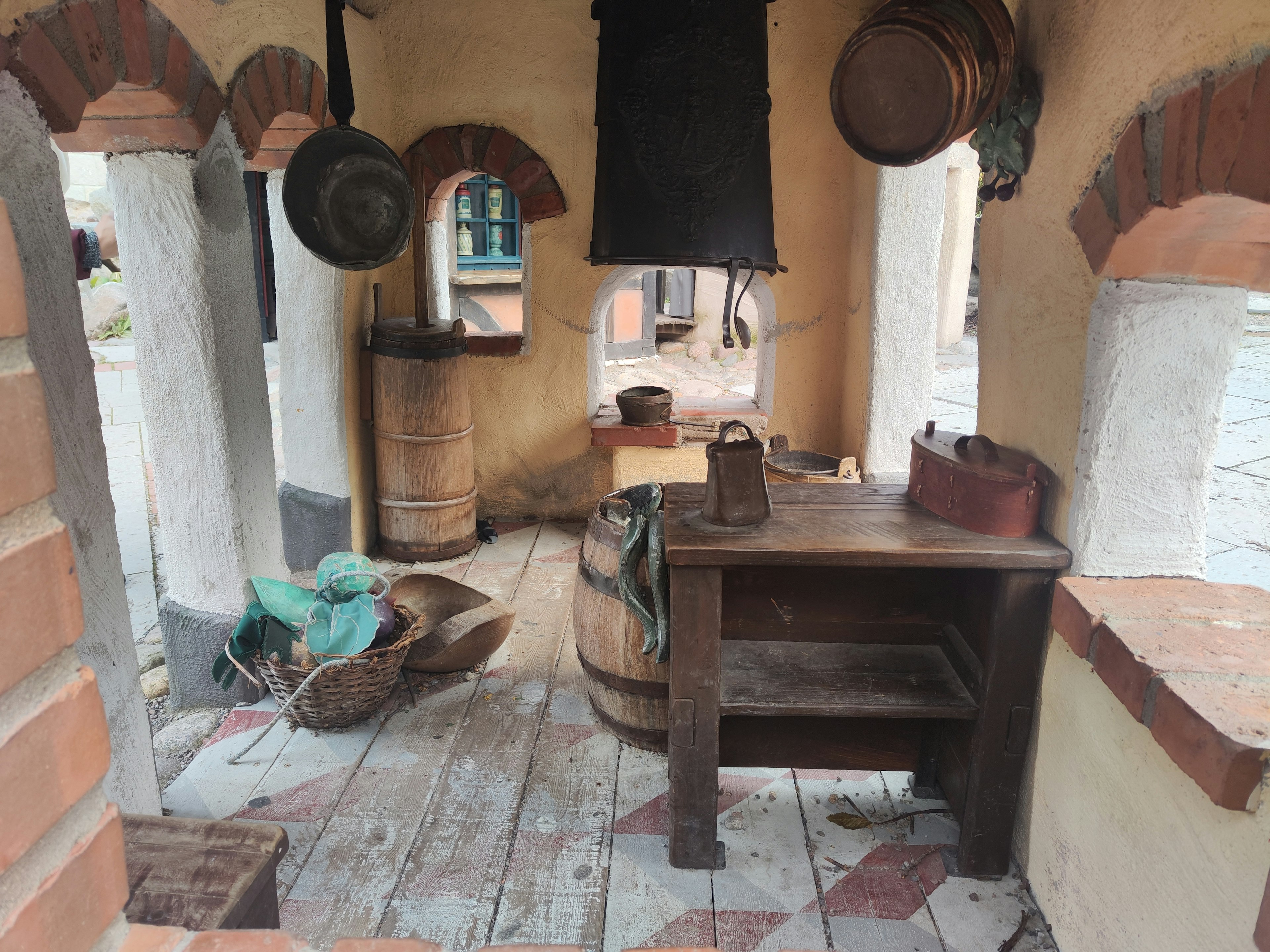 Traditional interior scene with props wooden table and various utensils