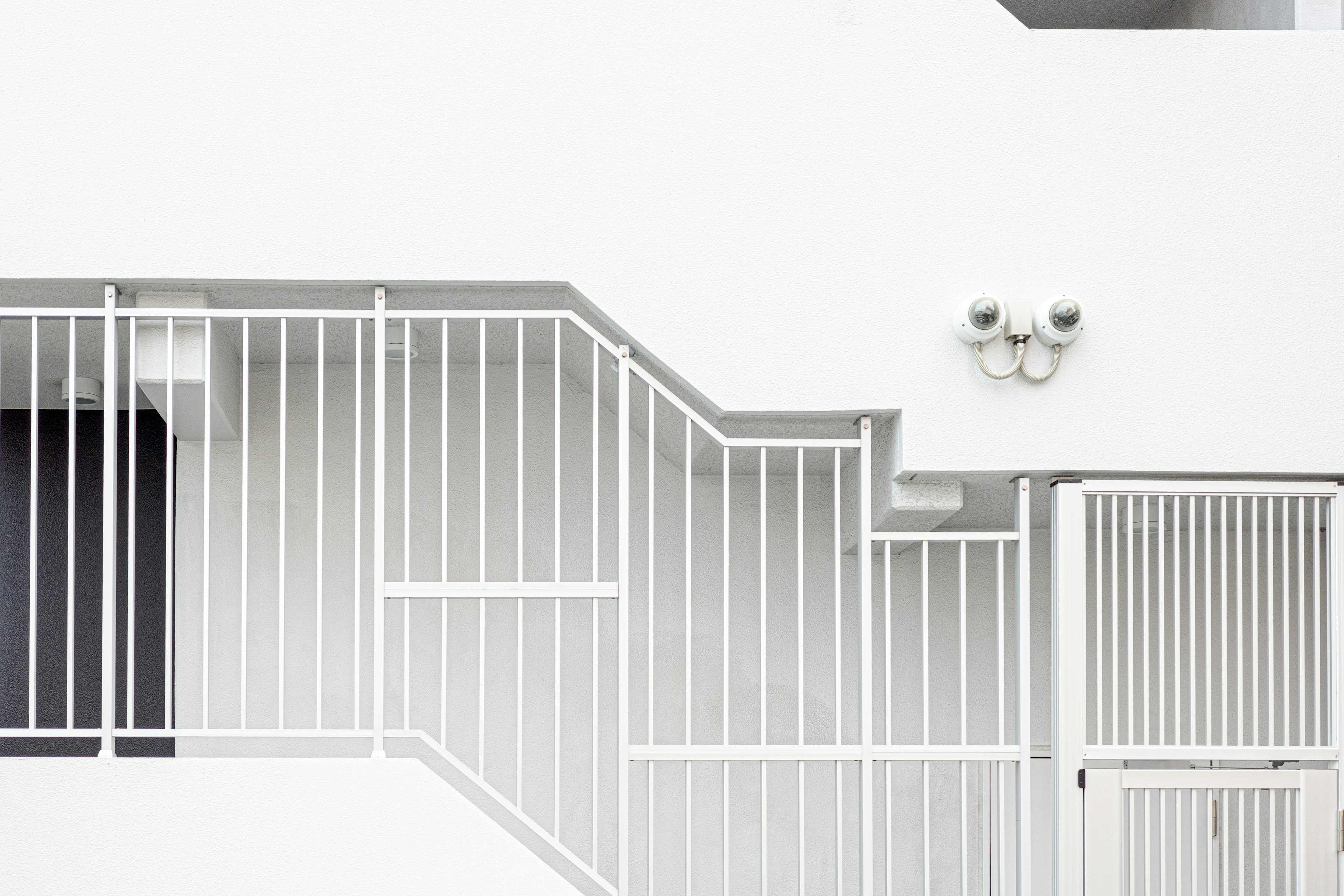 Image featuring a white staircase and railing design