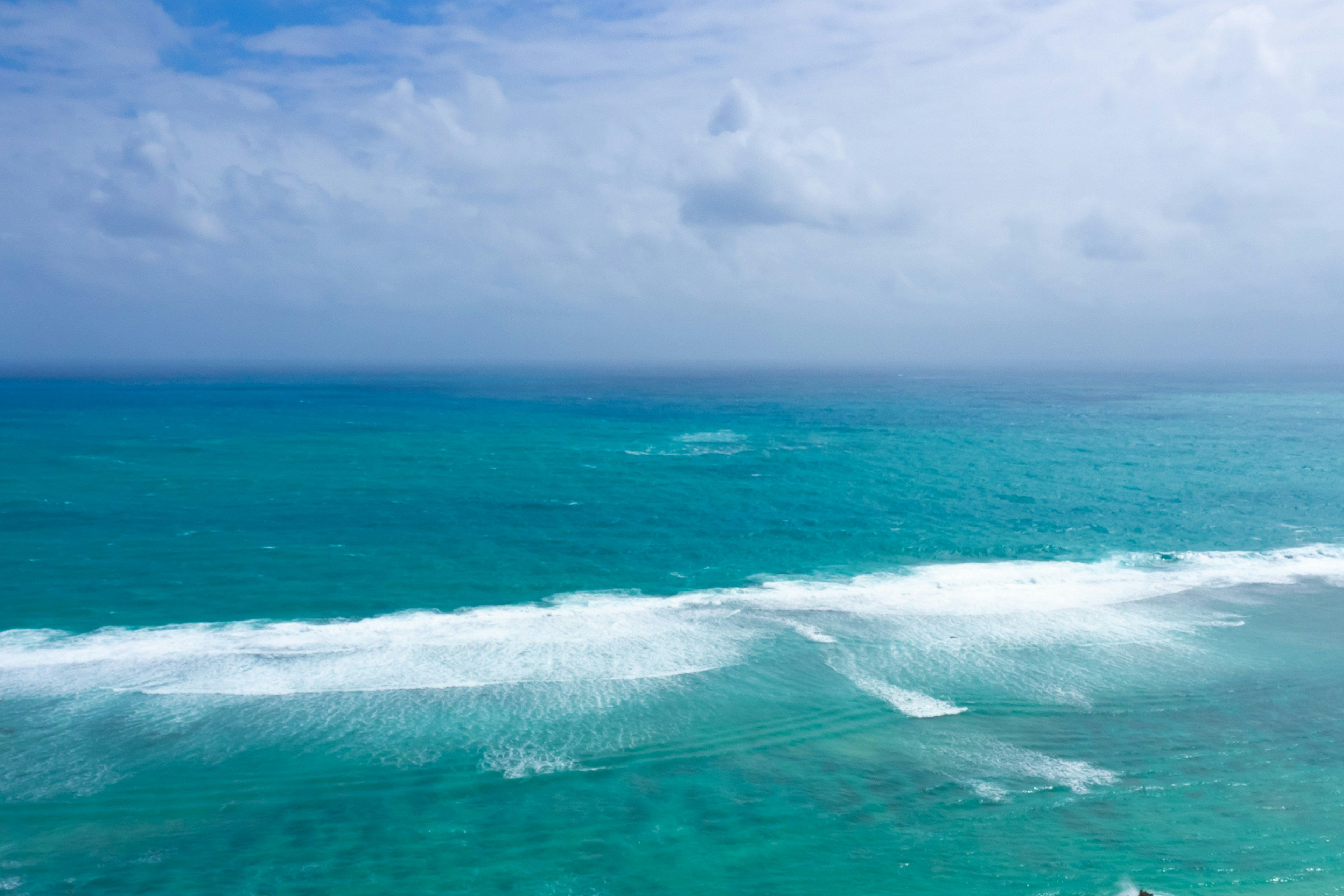 Beautiful seascape with blue ocean and white waves