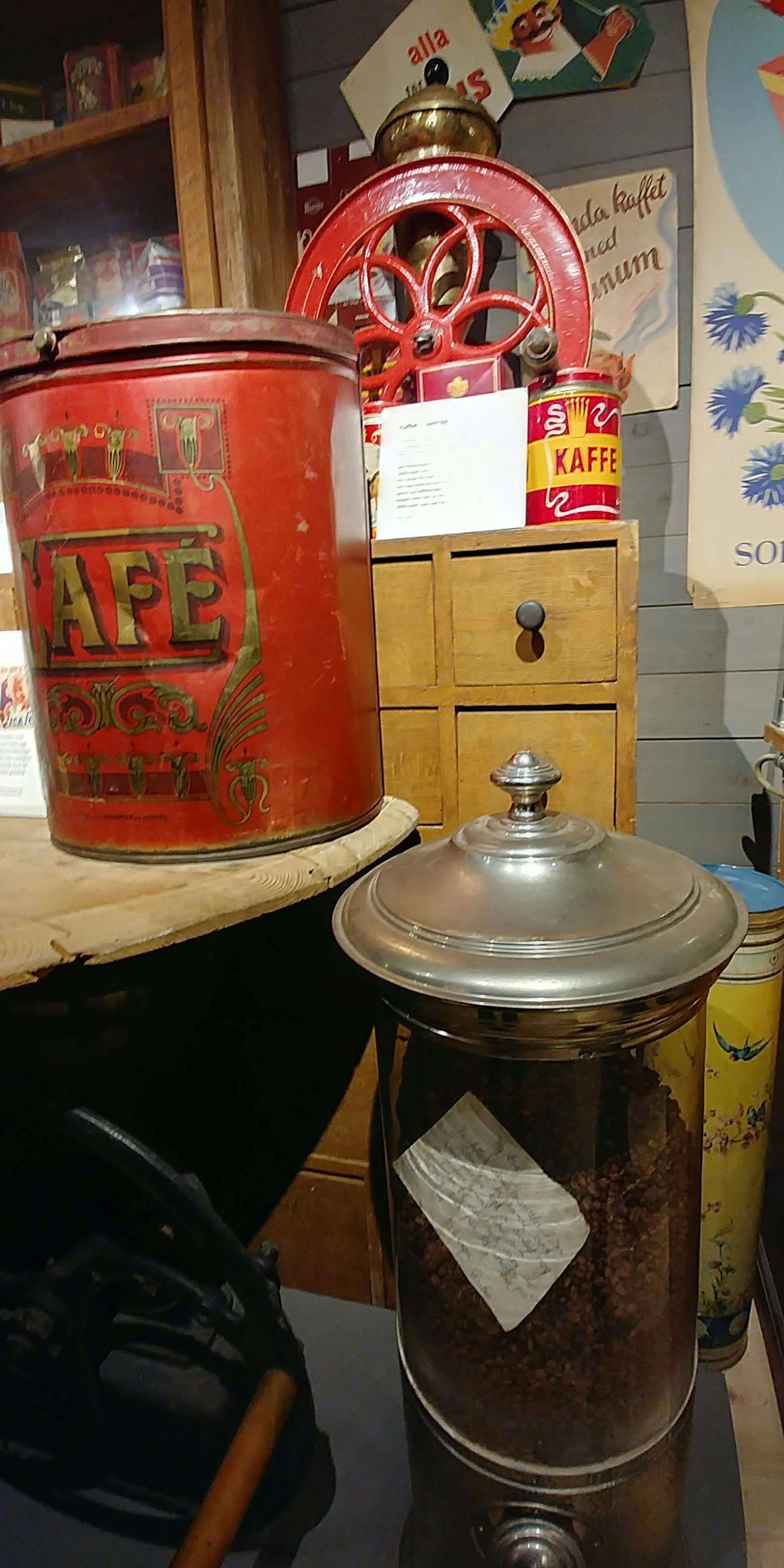 Vintage coffee can and grinder displayed in a retro setting