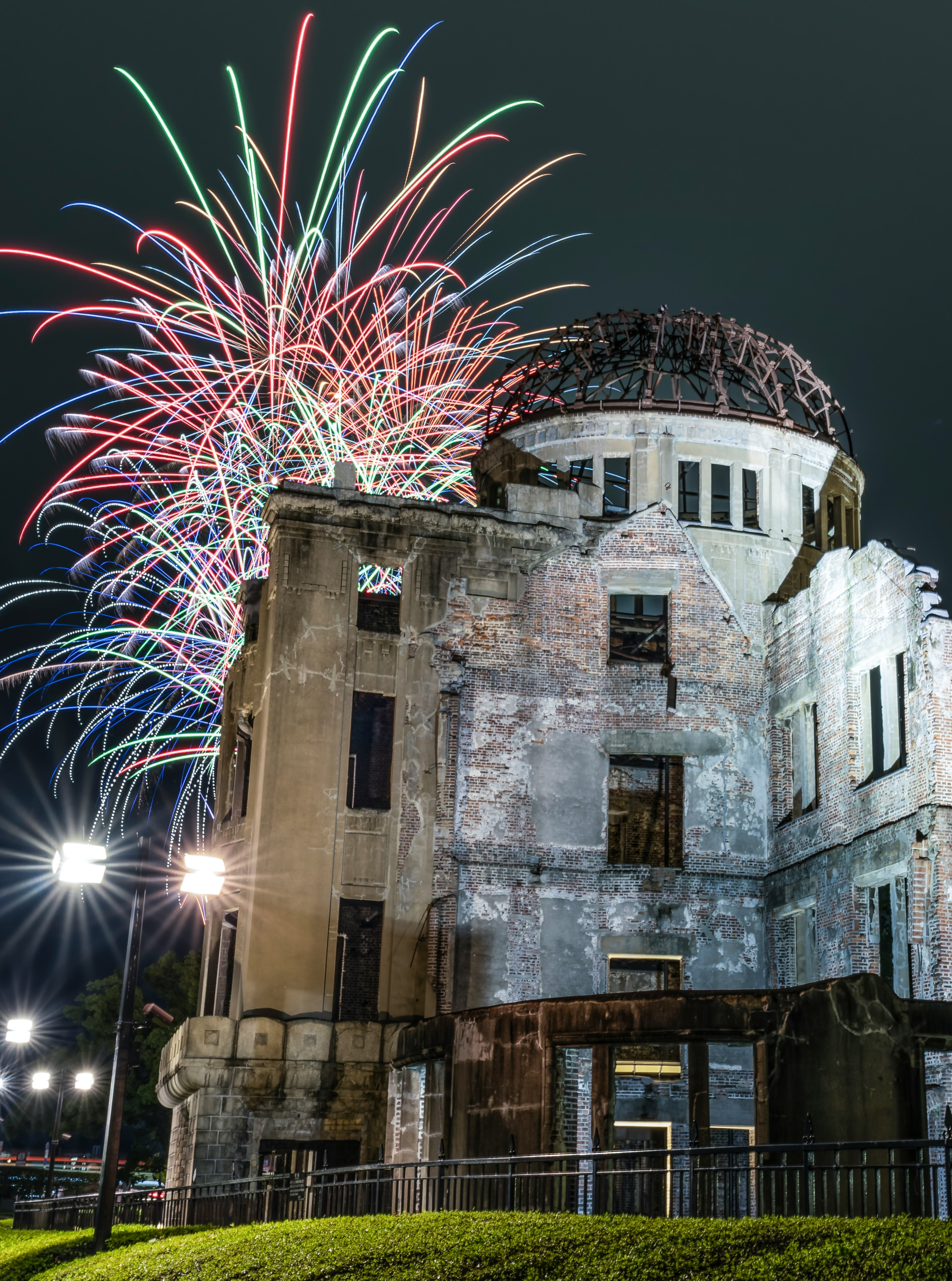 Hiroshima Peace Memorial Museum at night with fireworks