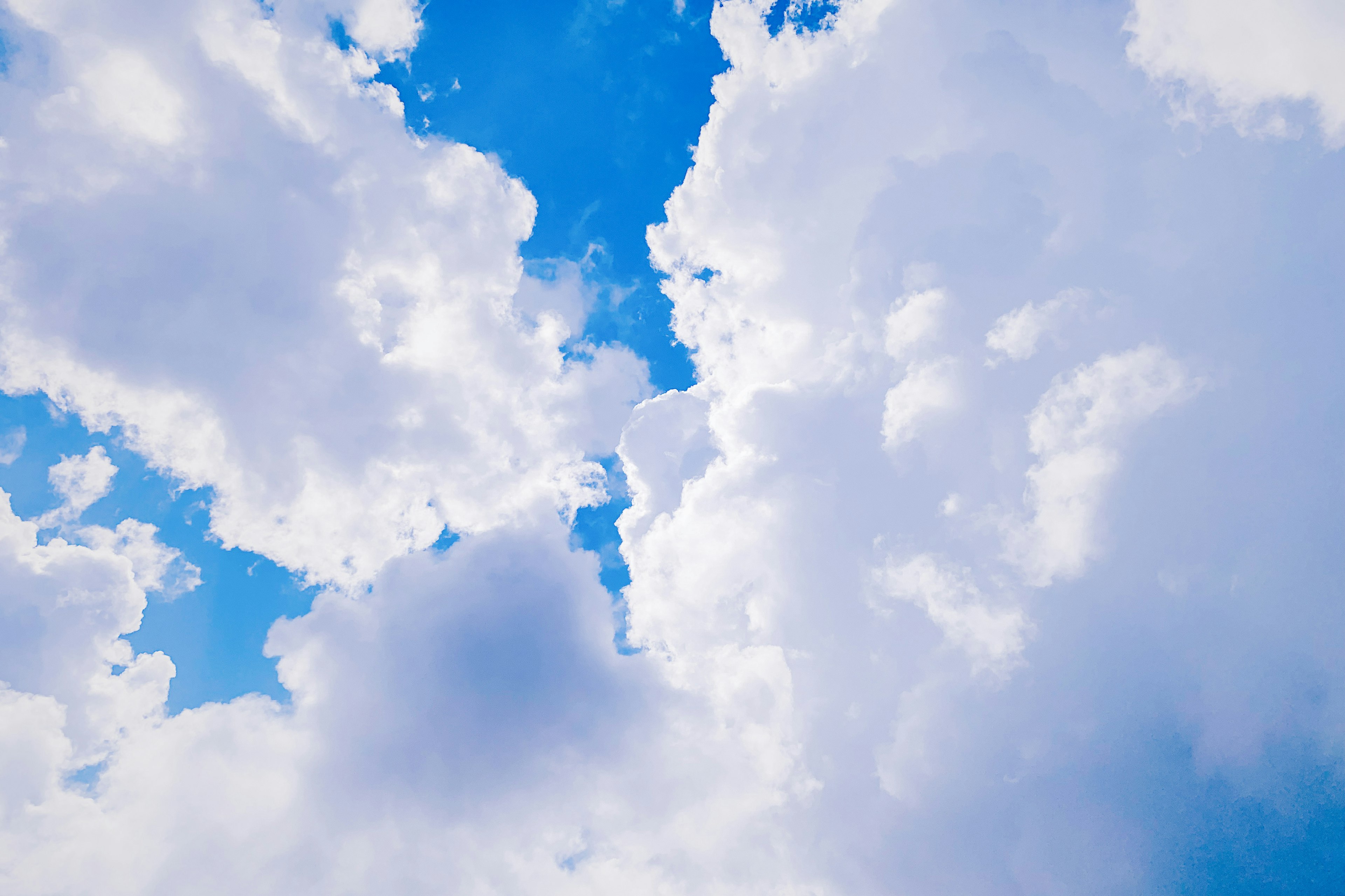 Beautiful view of blue sky with fluffy white clouds