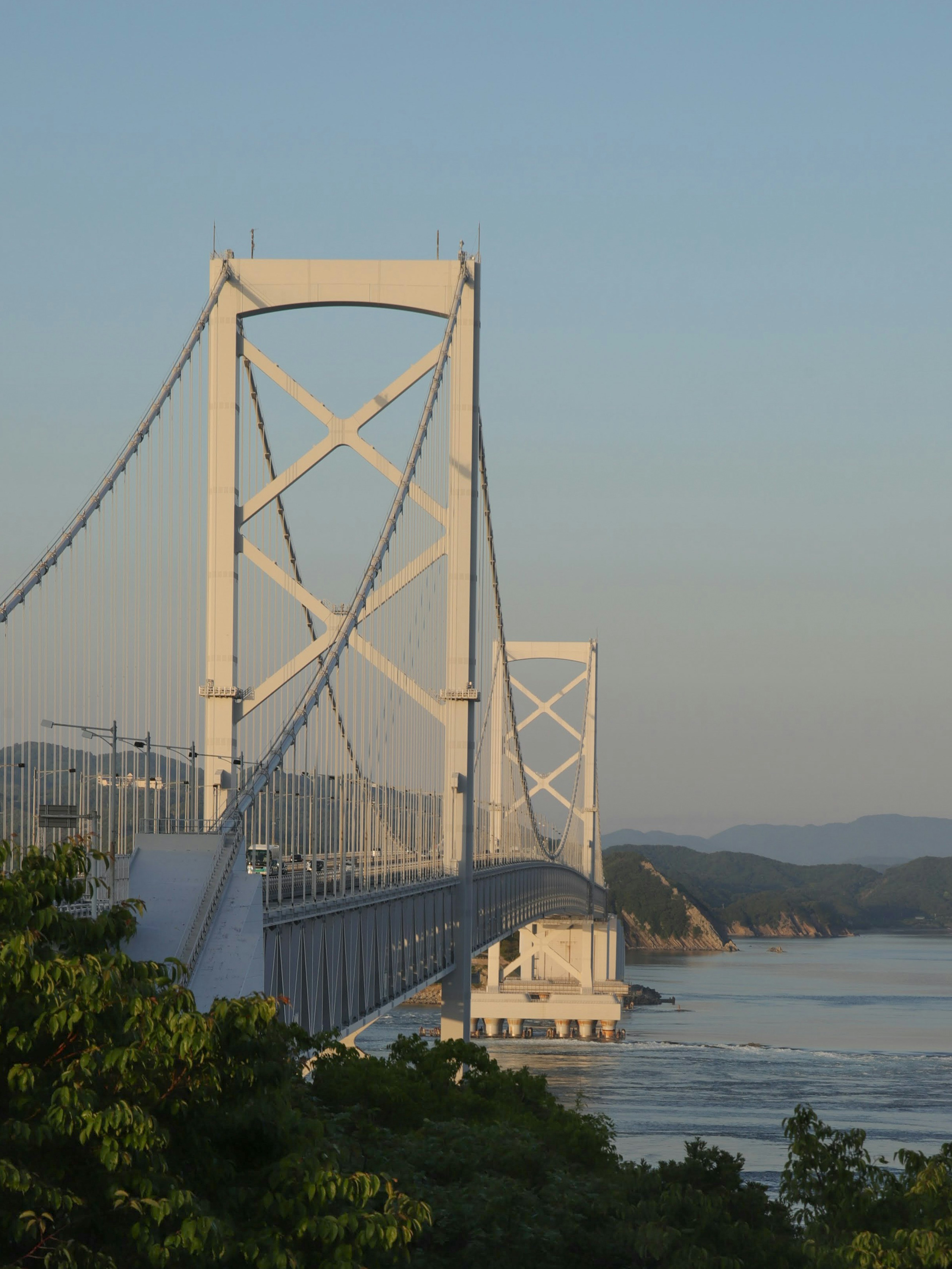 White bridge against a blue sky