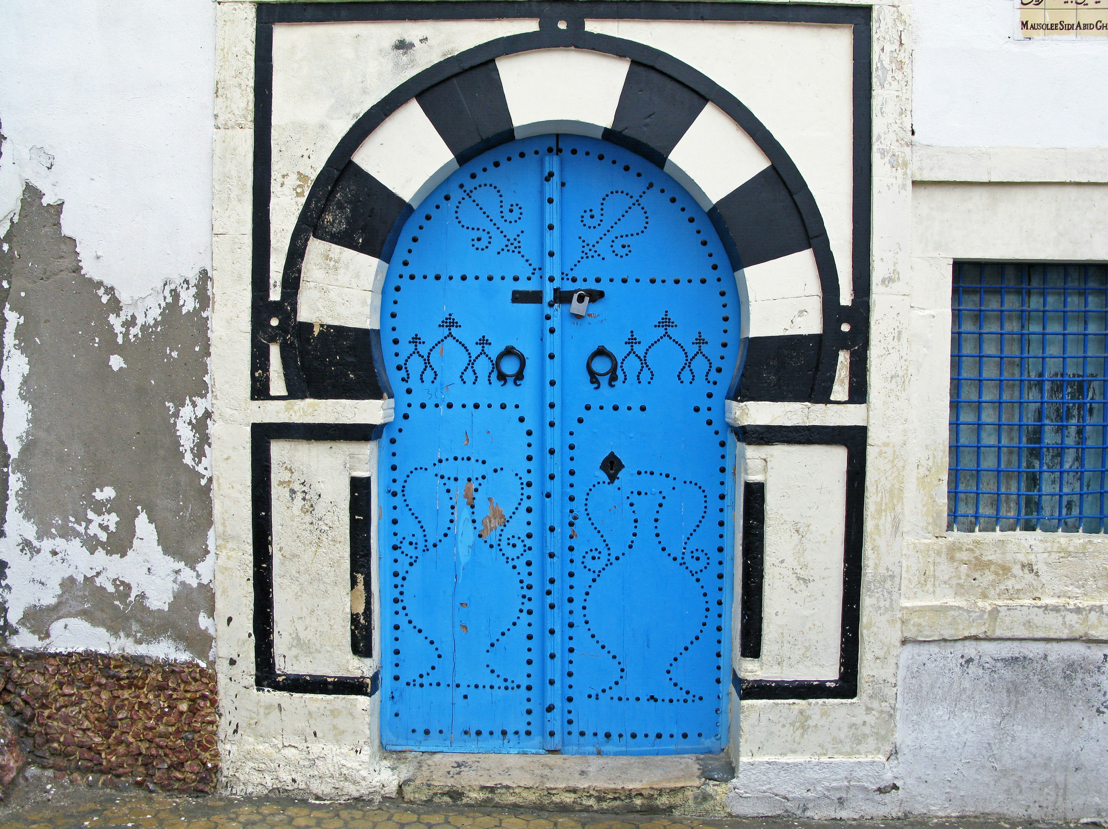 Decorative blue door with black frame design