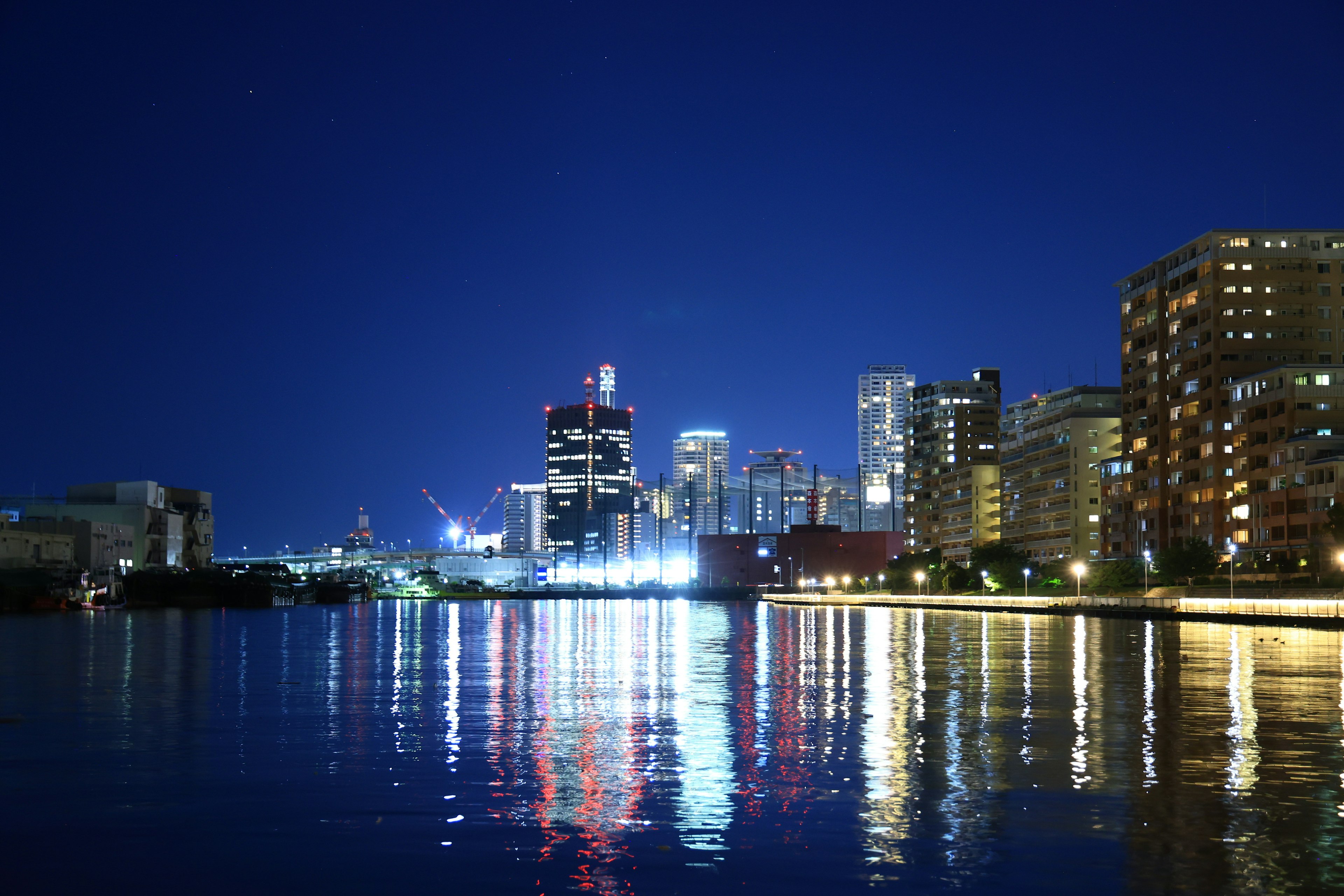 Beautiful cityscape at night reflecting on the water