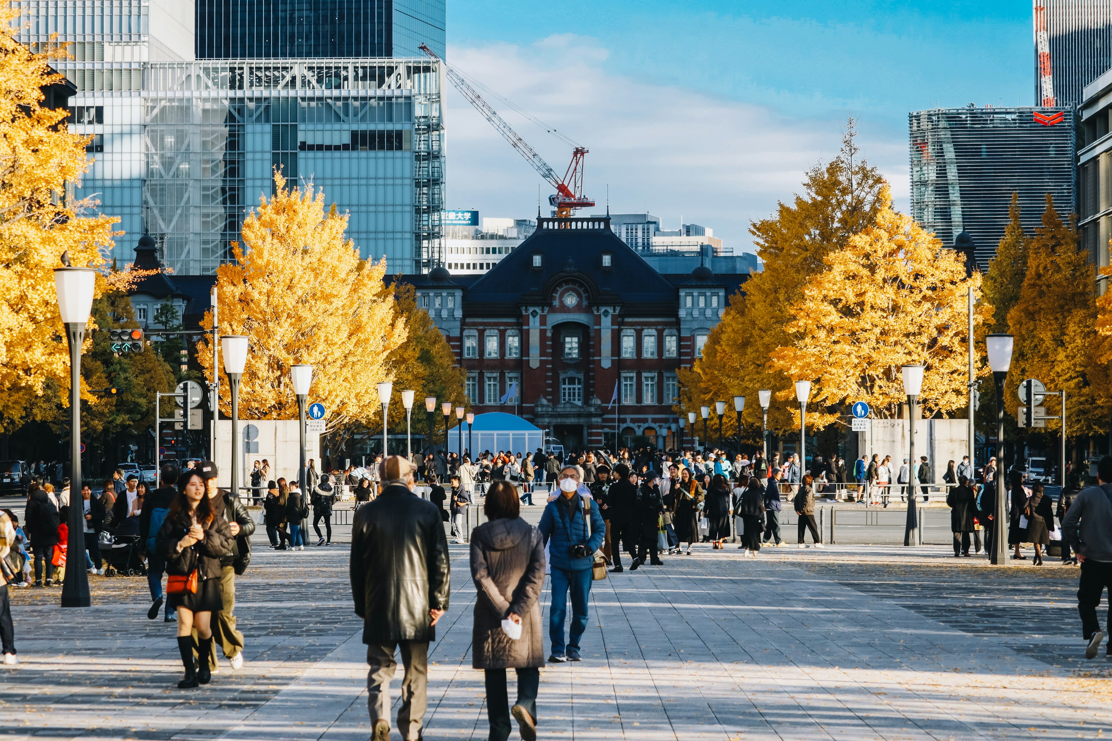 Autumn scene around Tokyo Station with people walking