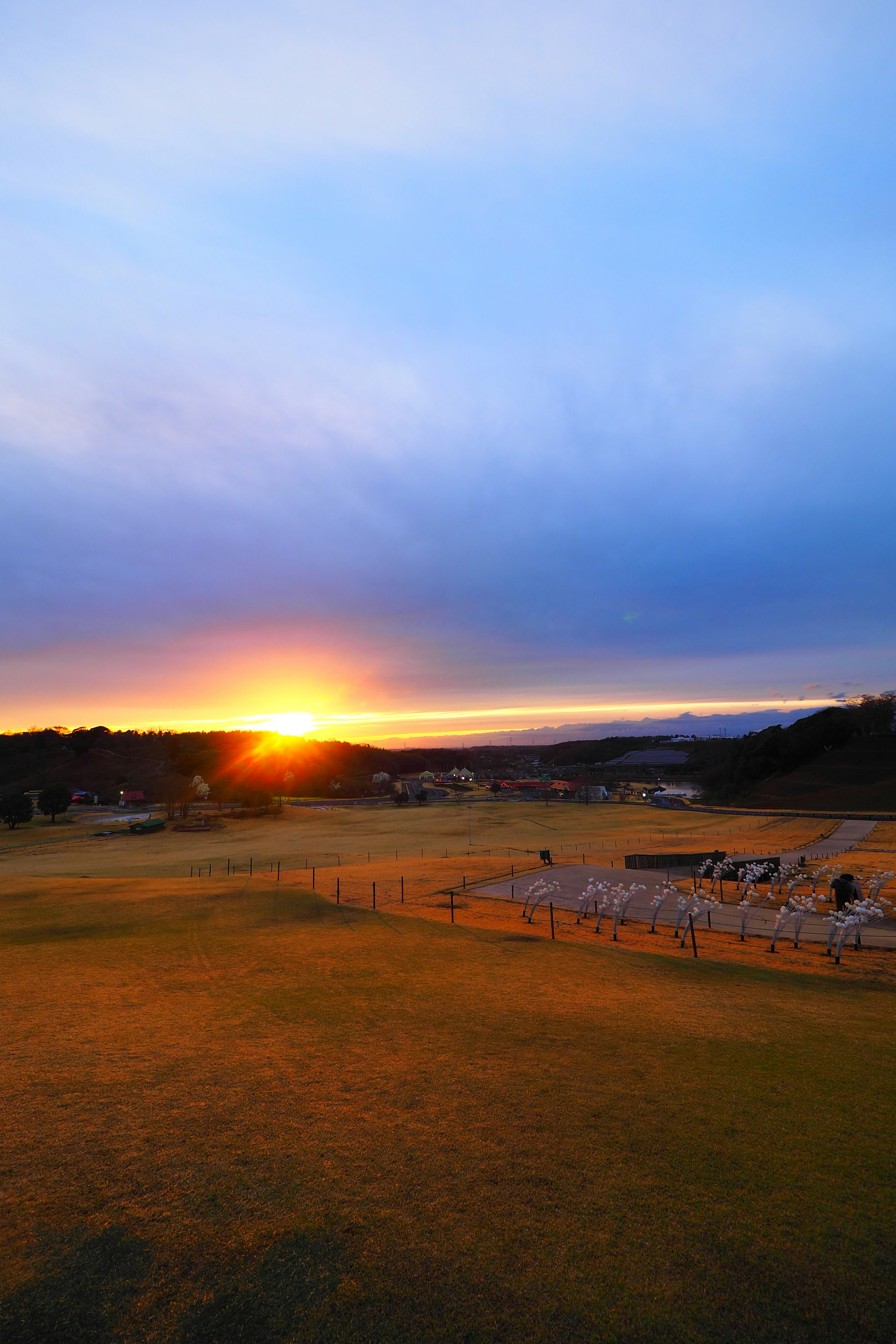 Sunset view with expansive blue sky