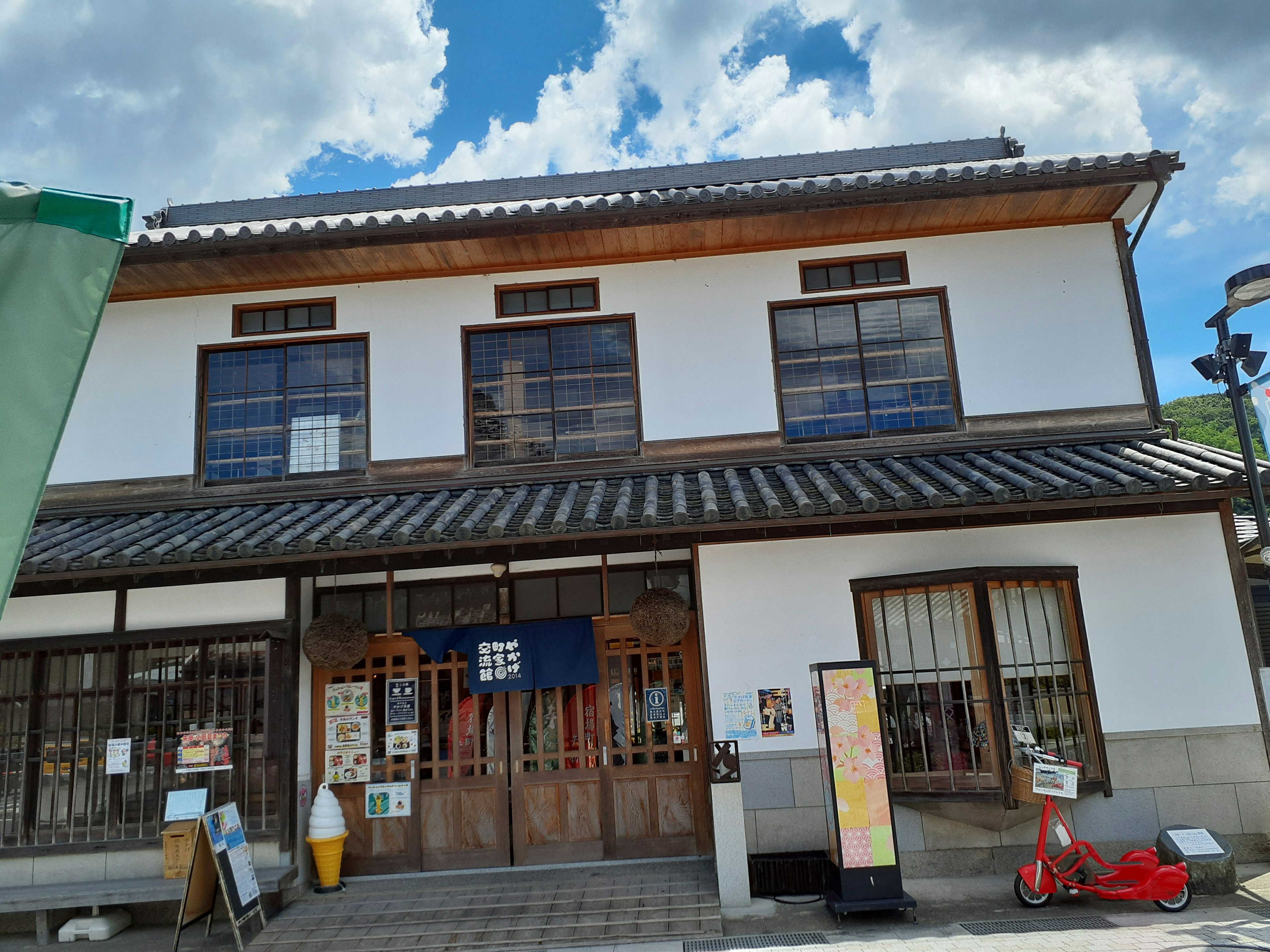 Traditional Japanese style building with wooden facade and blue sky