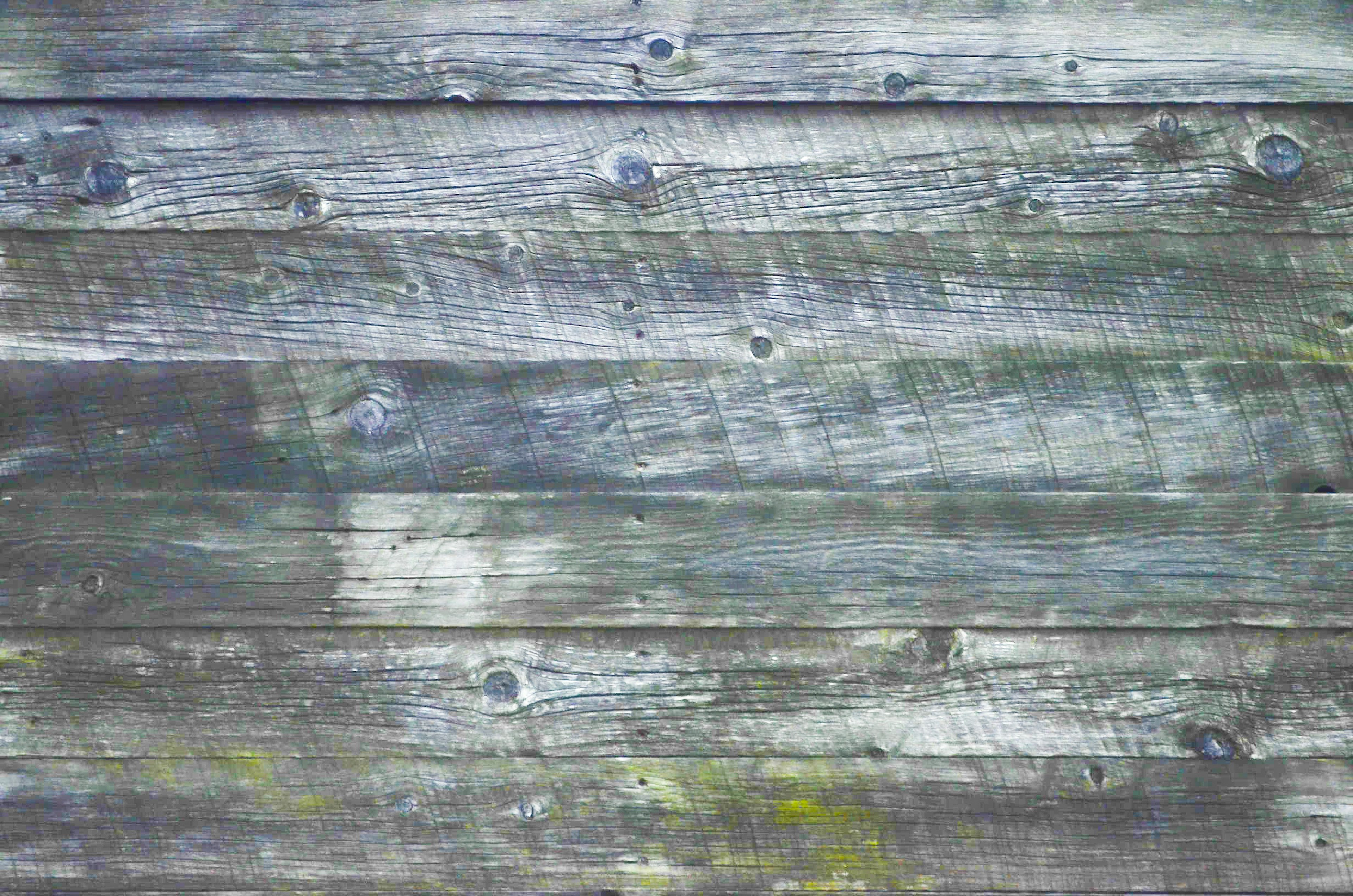 Weathered wooden texture with gray tones