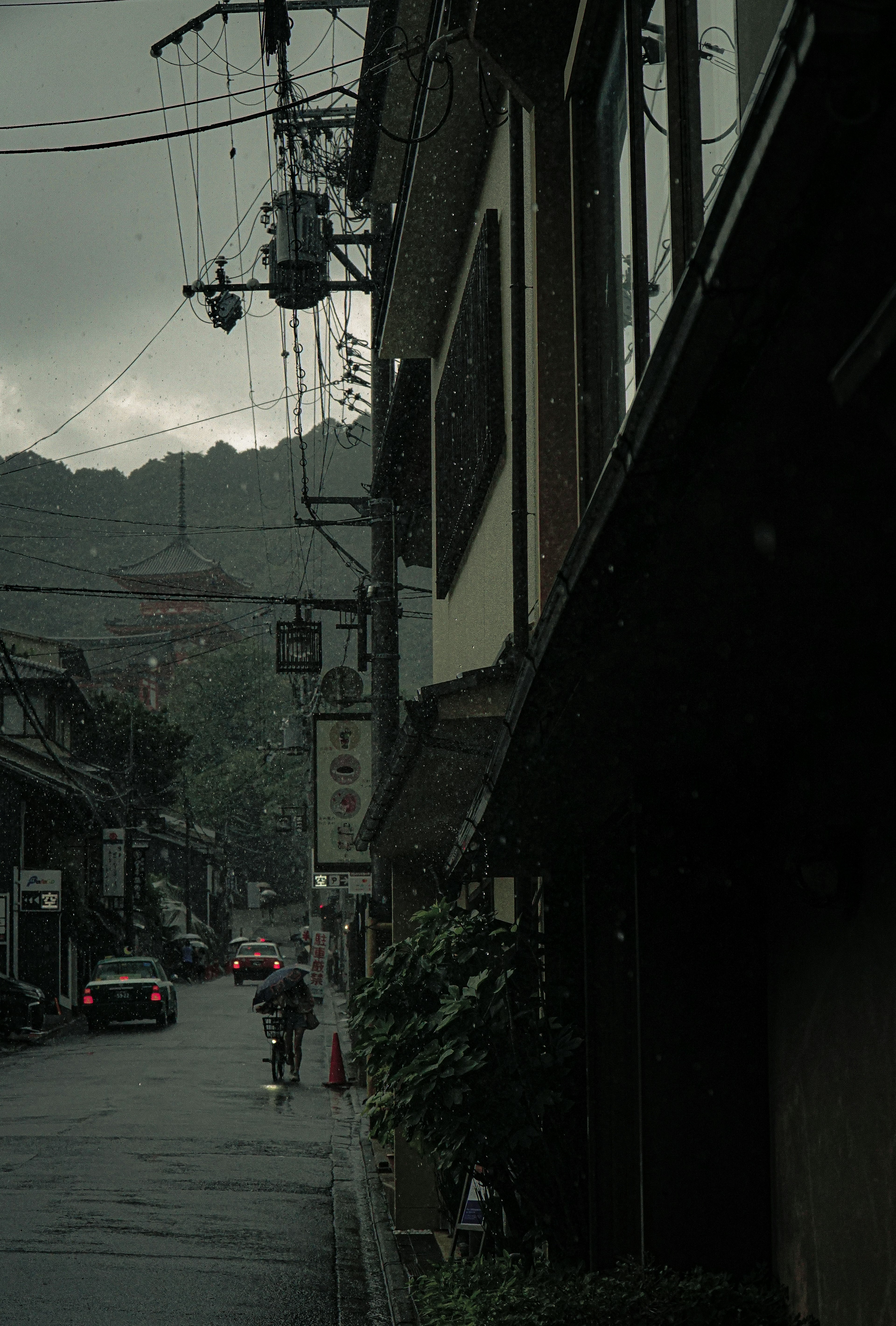 Quiet street scene with old buildings in the rain