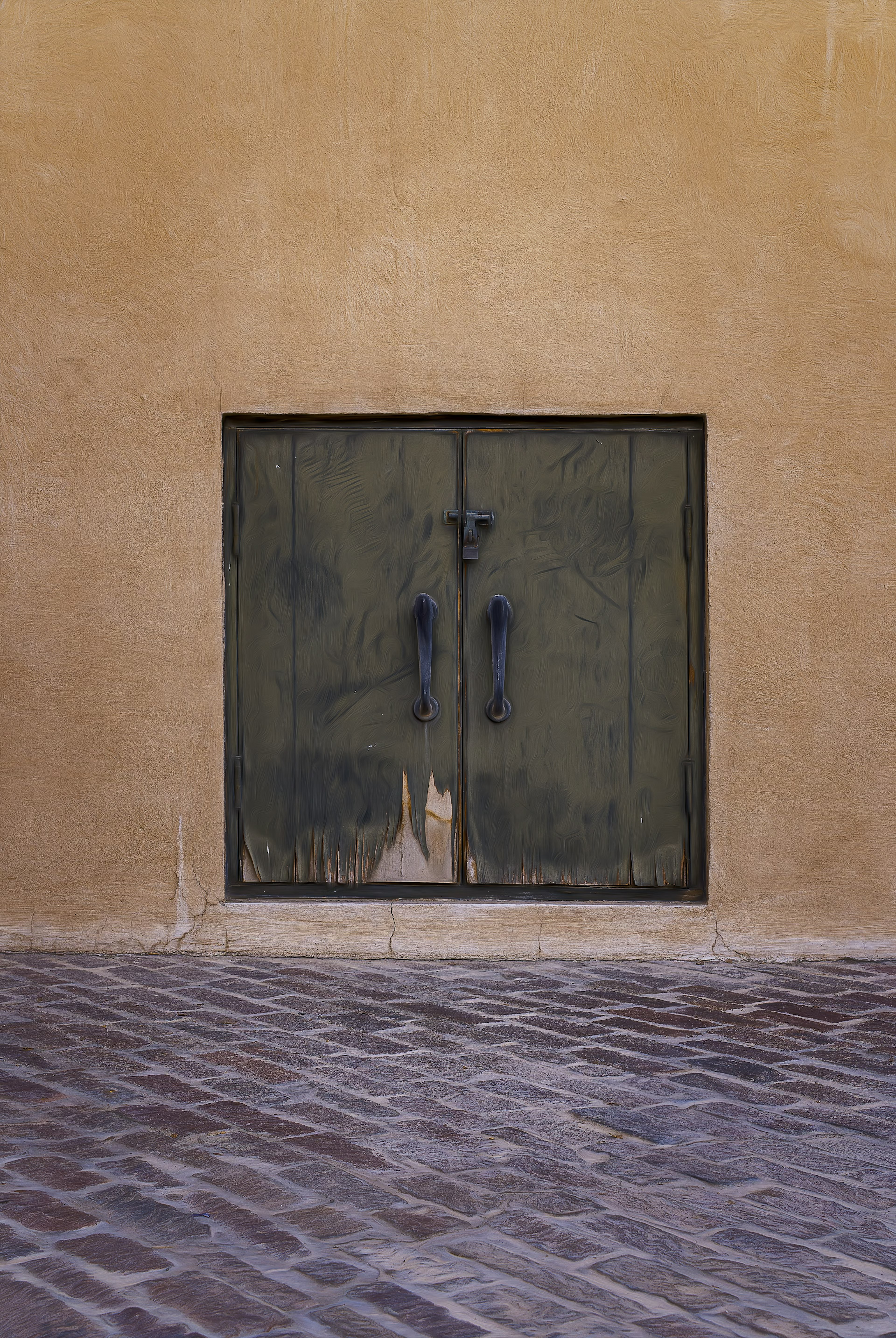 Photo d'une vieille porte verte sur un mur texturé