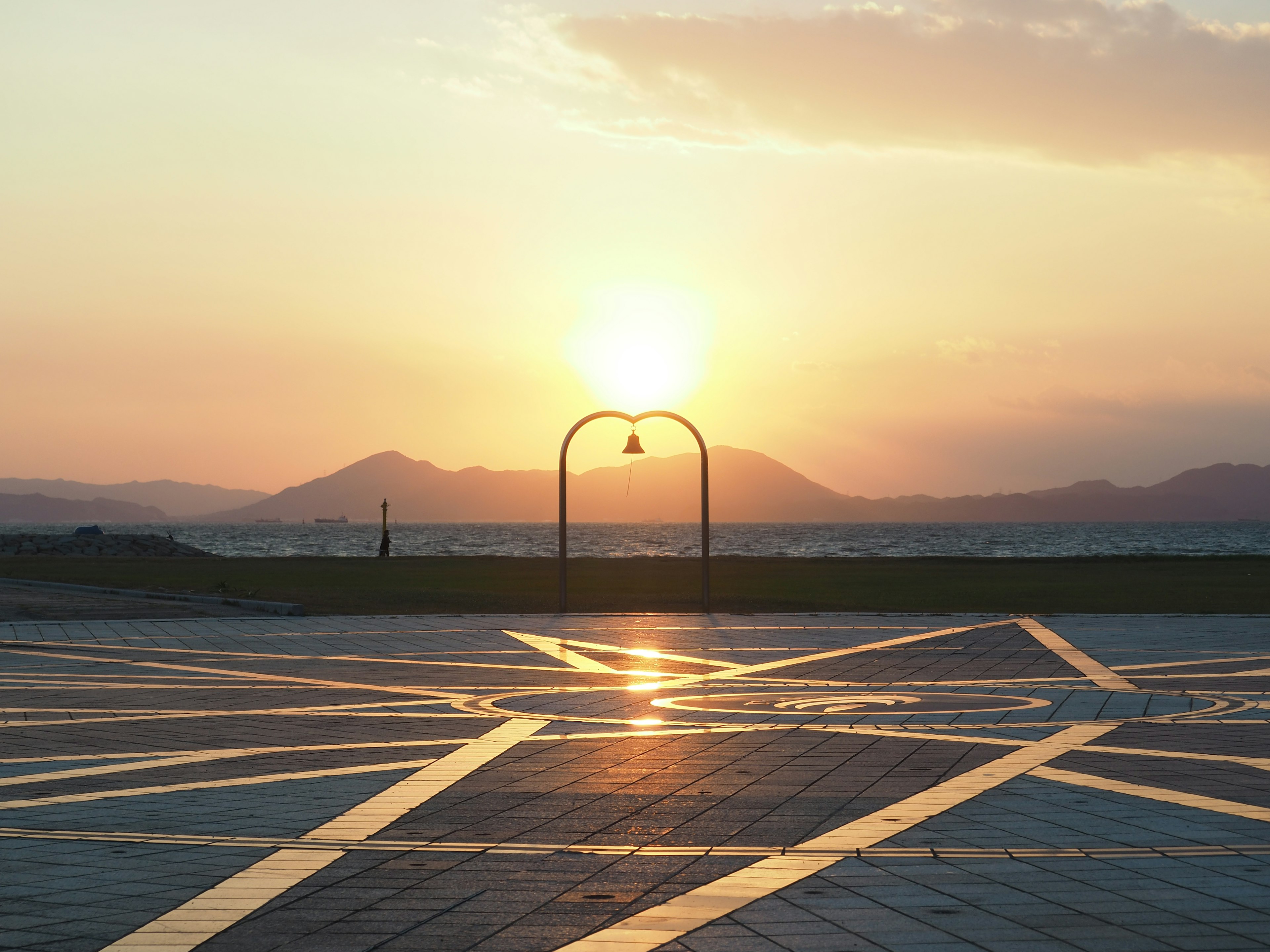 Scenic sunset with geometric patterned pavement