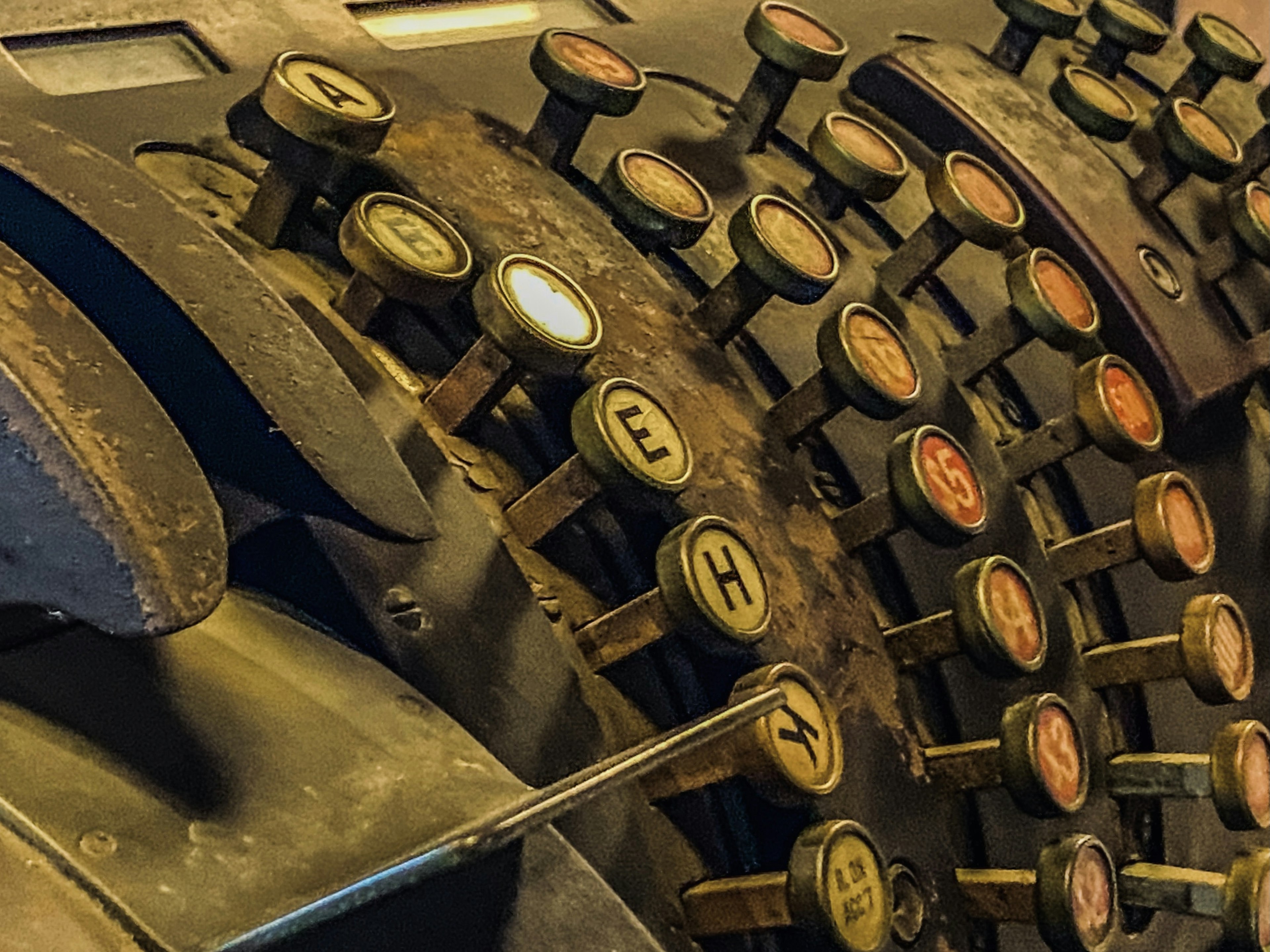 Close-up of vintage typewriter keys showing wear and patina