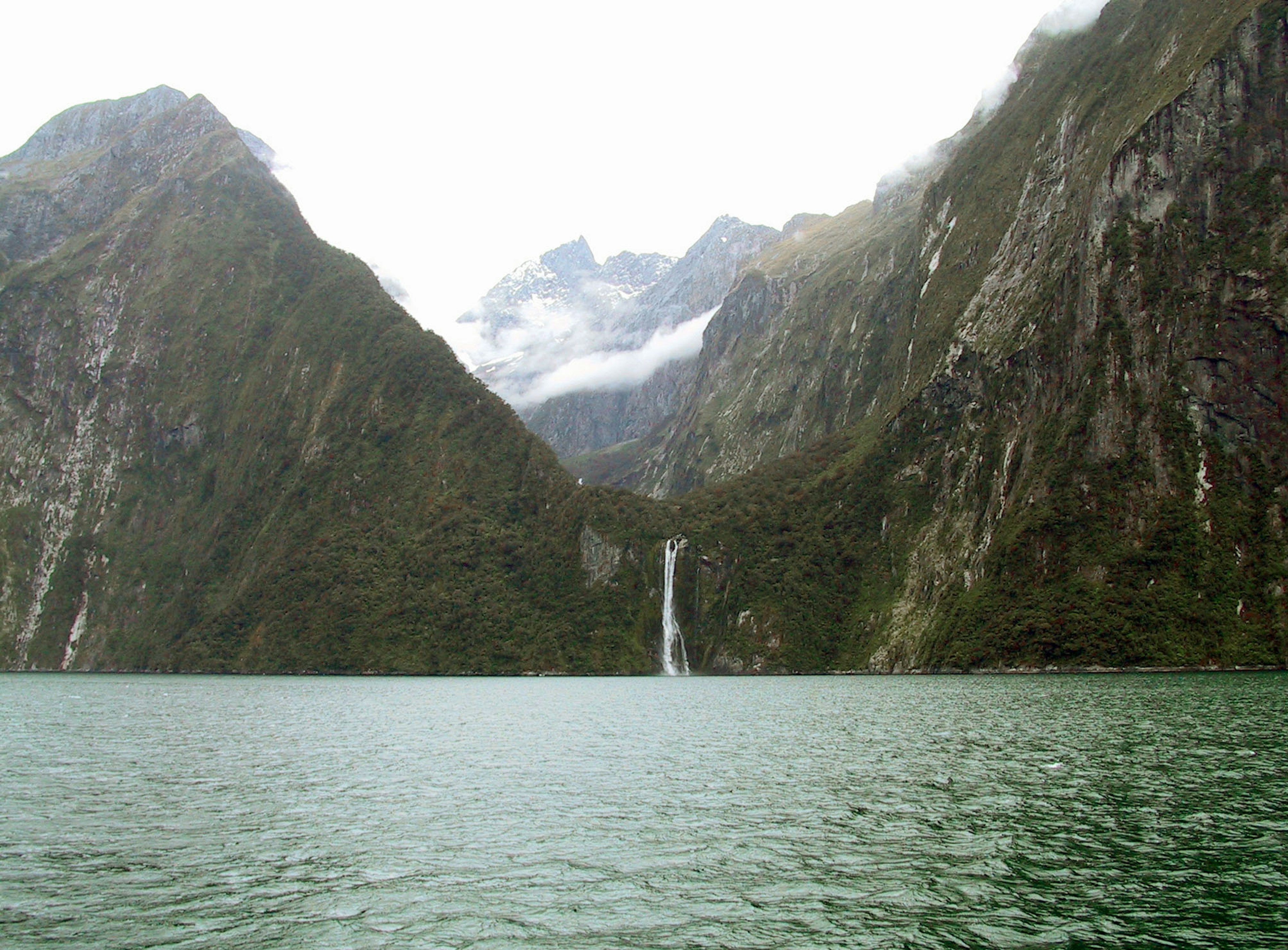 Majestic landscape of Milford Sound with mountains and waterfall