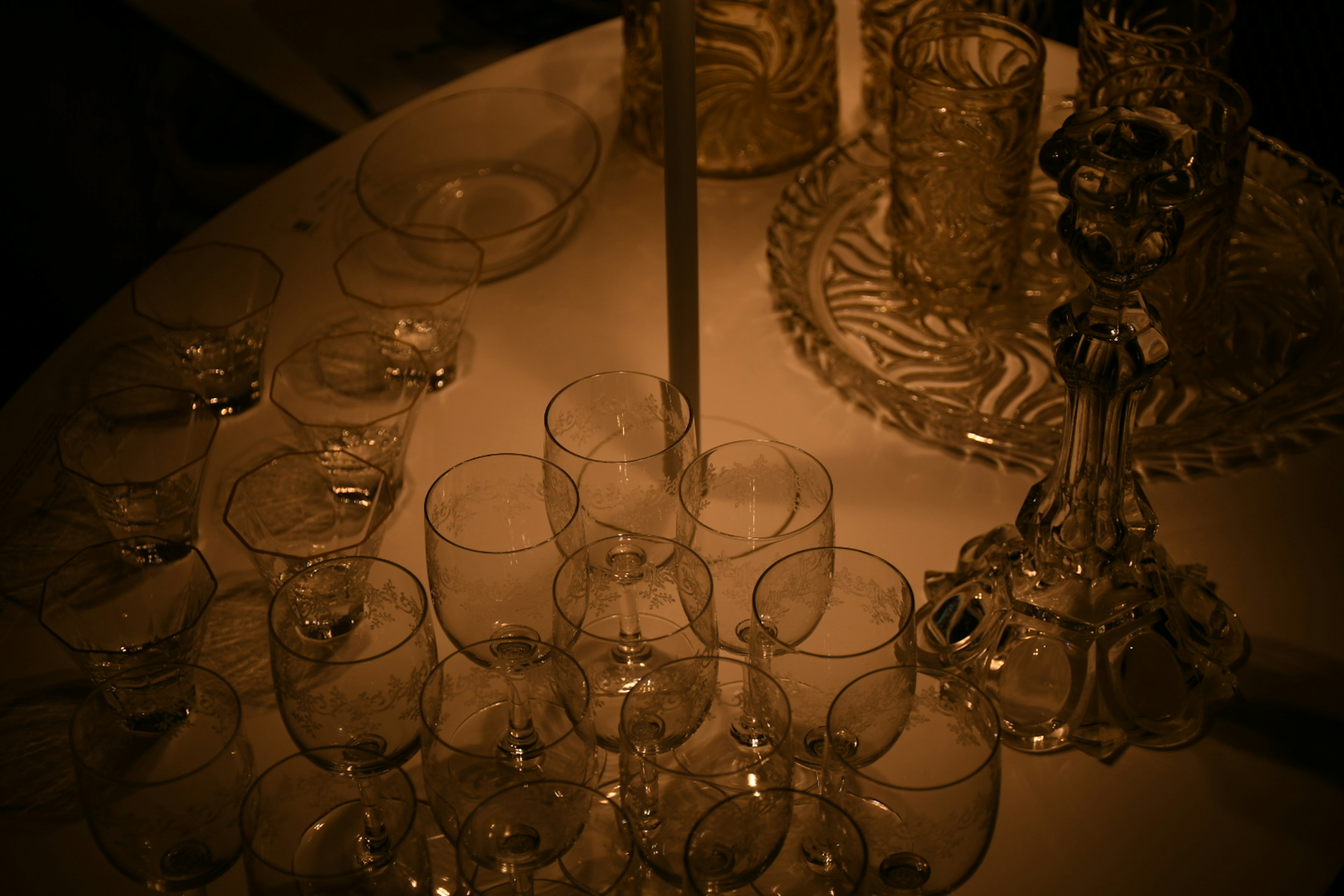 Collection of transparent glassware and dishes on a table