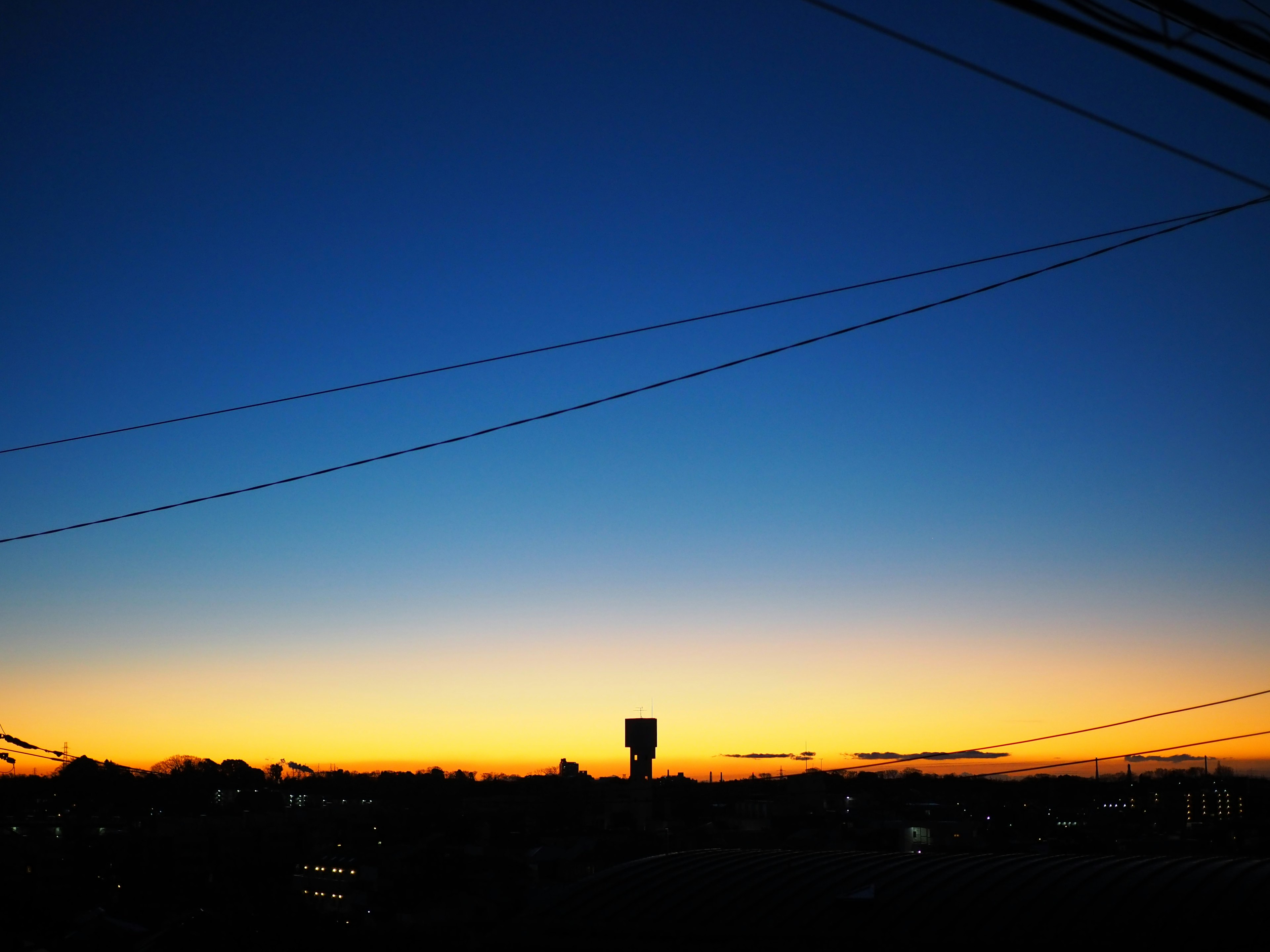 Beautiful gradient of blue to orange sunset in the sky